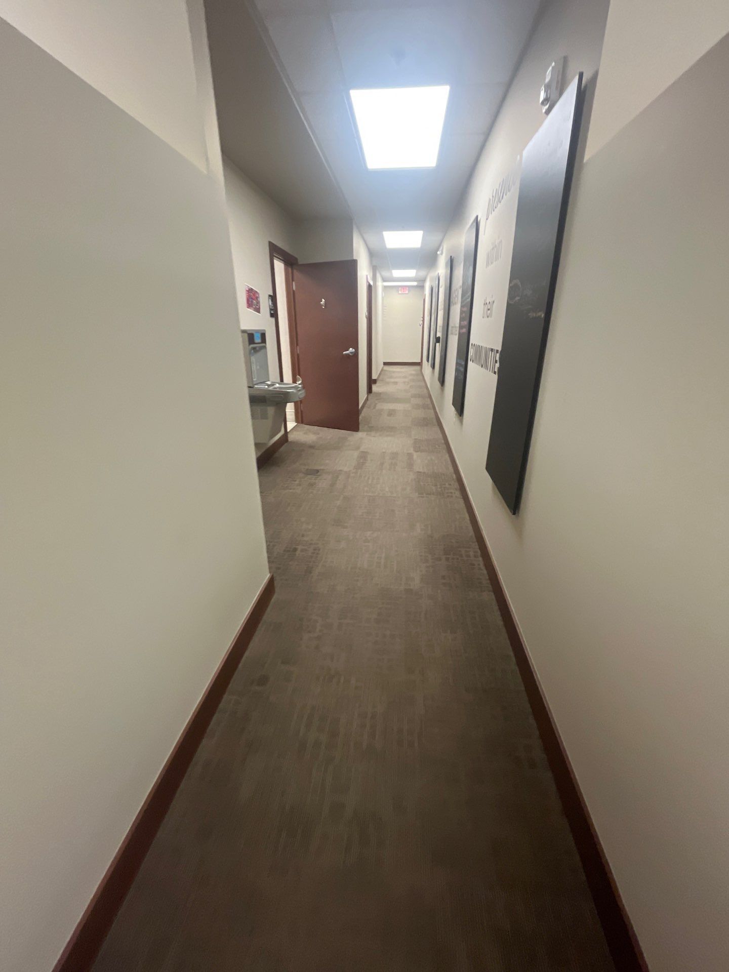 Commercial Office Interior Remodel and Modern Suite Refresh in Sioux Falls by Select Painting, Coatings & Garage Cabinets