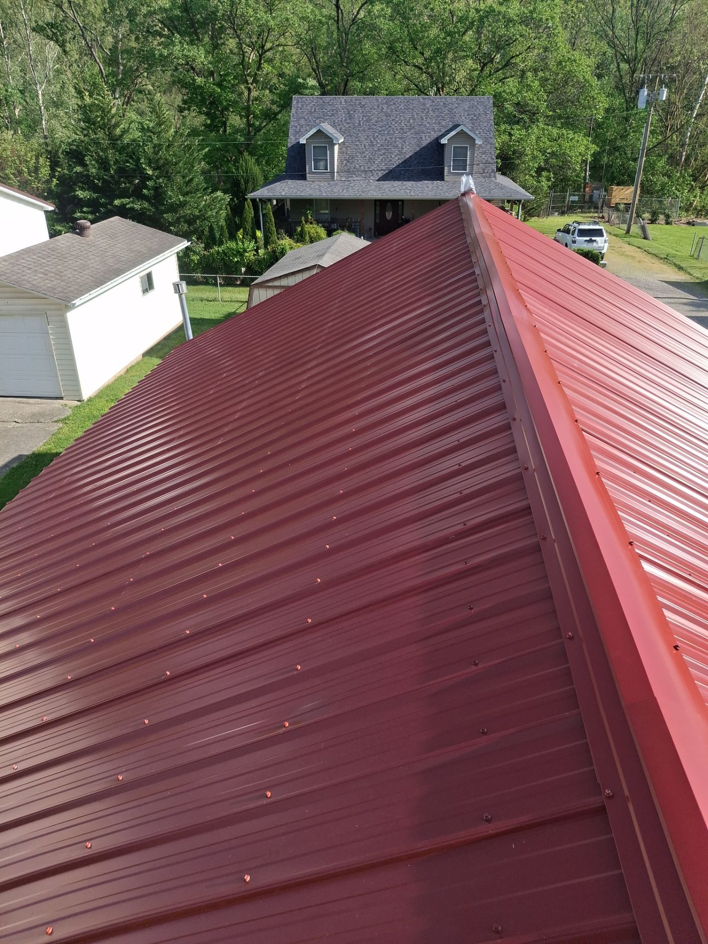 Residential Roofing Installation using Metal by Rainstoppers Roofing