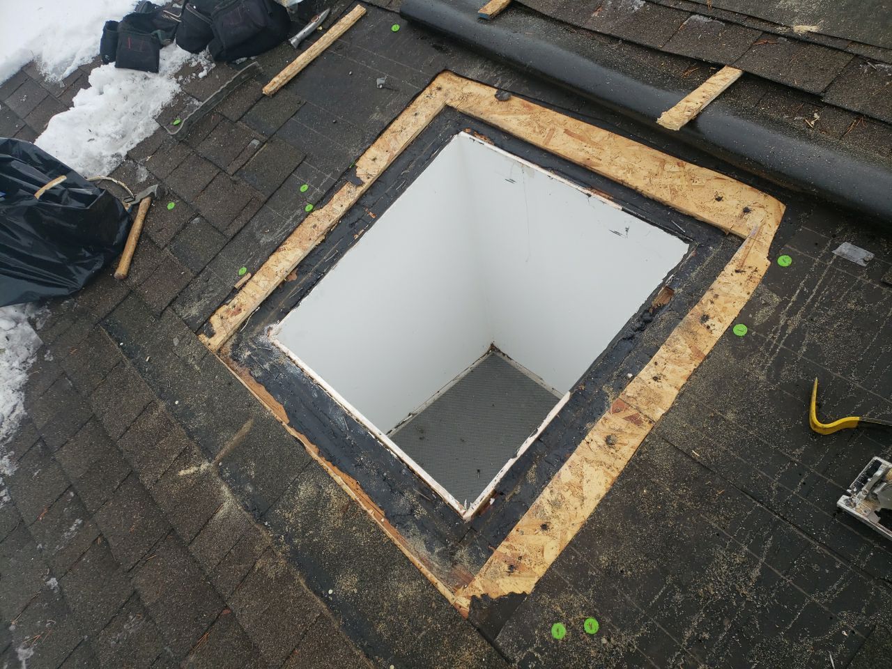 Skylight Removal using Shingle Repair by The Roof Doctor