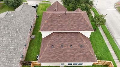 Full Roof Replacement in Warm Brown Tones — Spring, TX