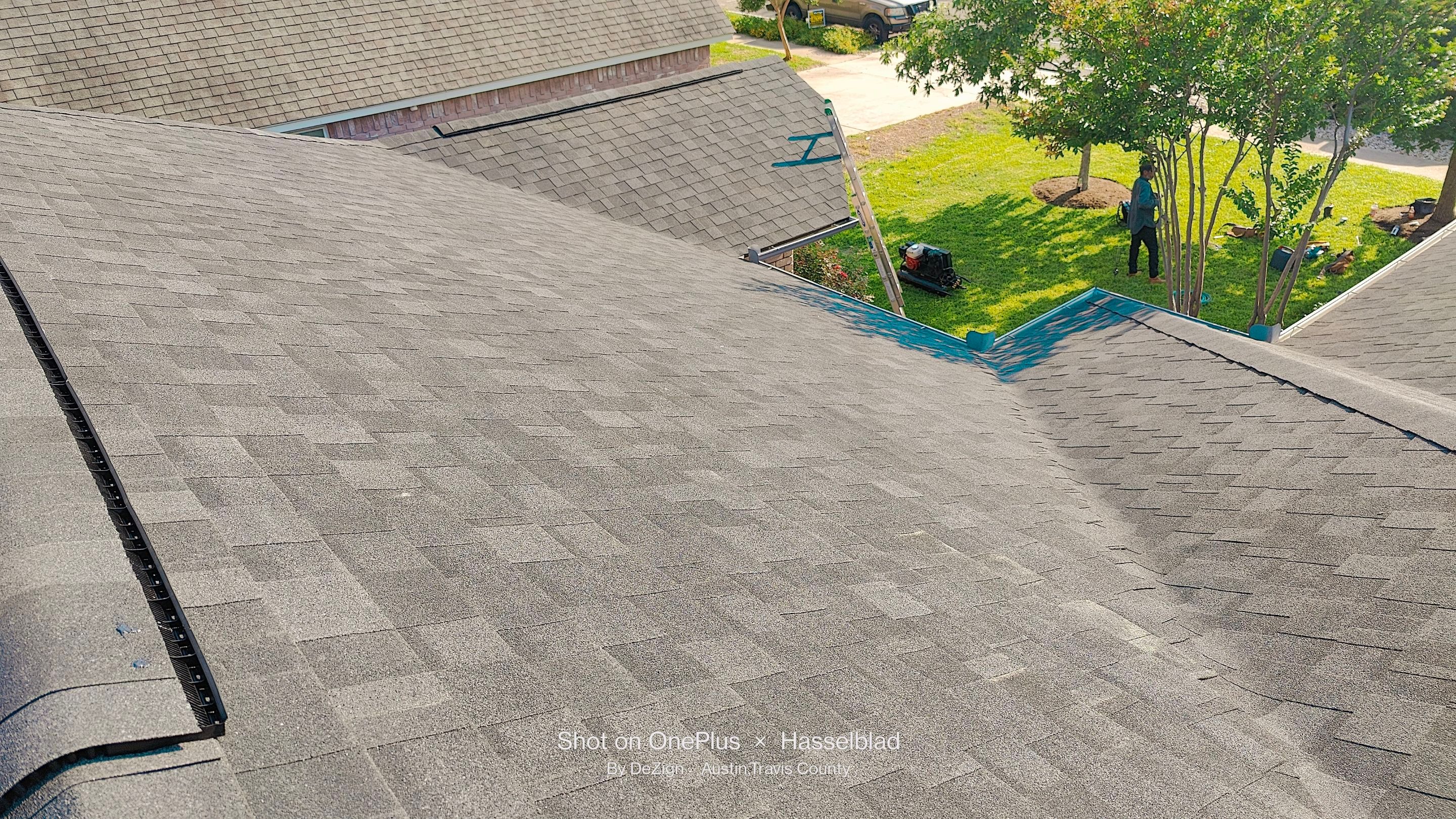 Residential Roofing Installation using IKO Dynasty Granite Black by DeZign Roofing & Exteriors