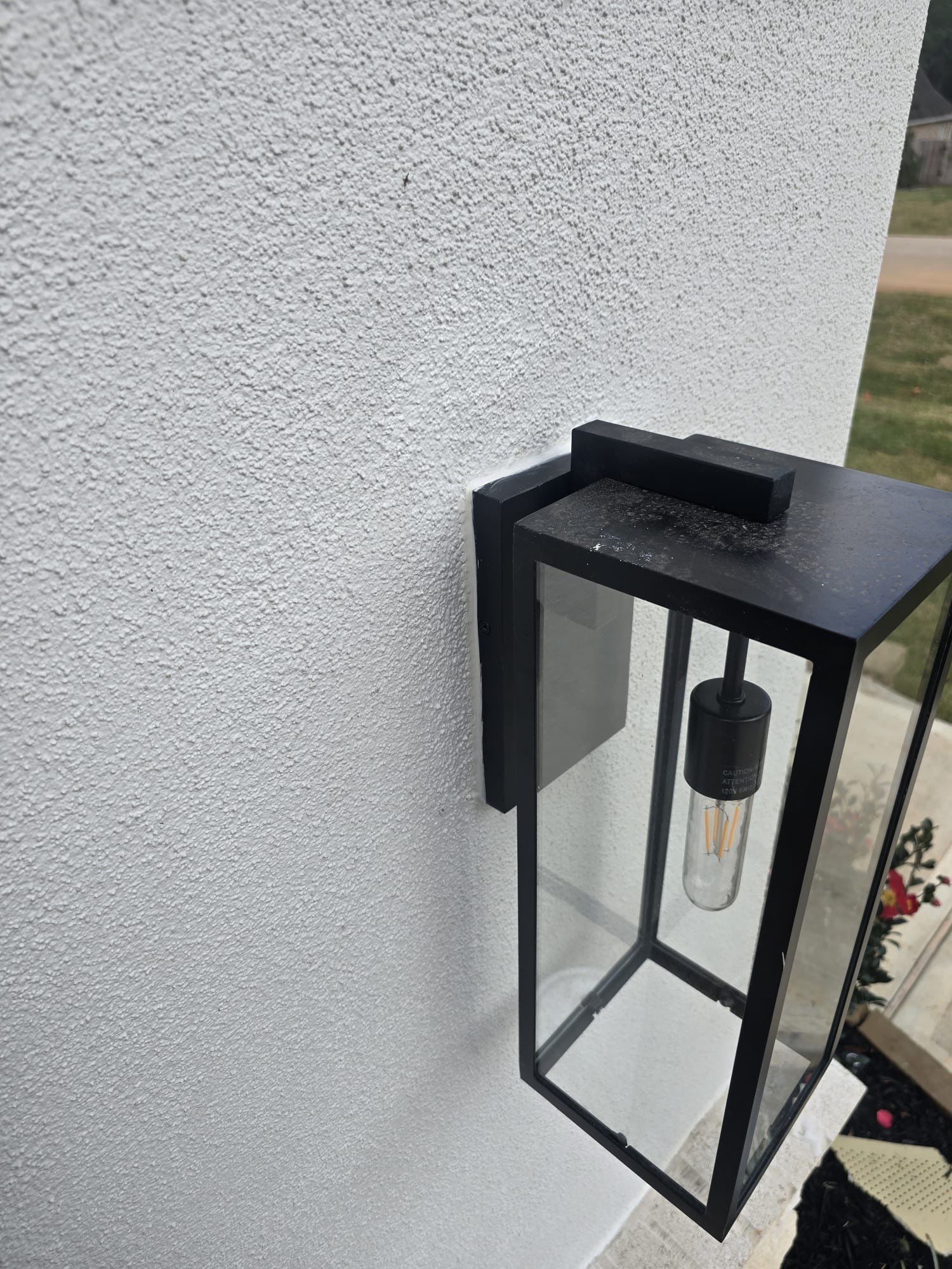 Conroe Elegance: Stucco, Foam Corbels, and Natural Stone Accents. by Apex Conventional Stucco Llc