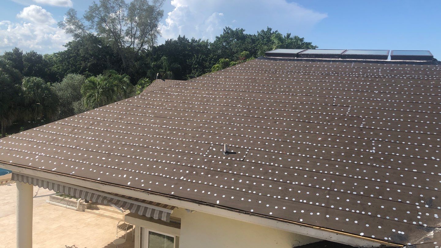 Residential Roofing Installation using 1" Nail strip metal roof by BLUES BROTHERS ROOFING