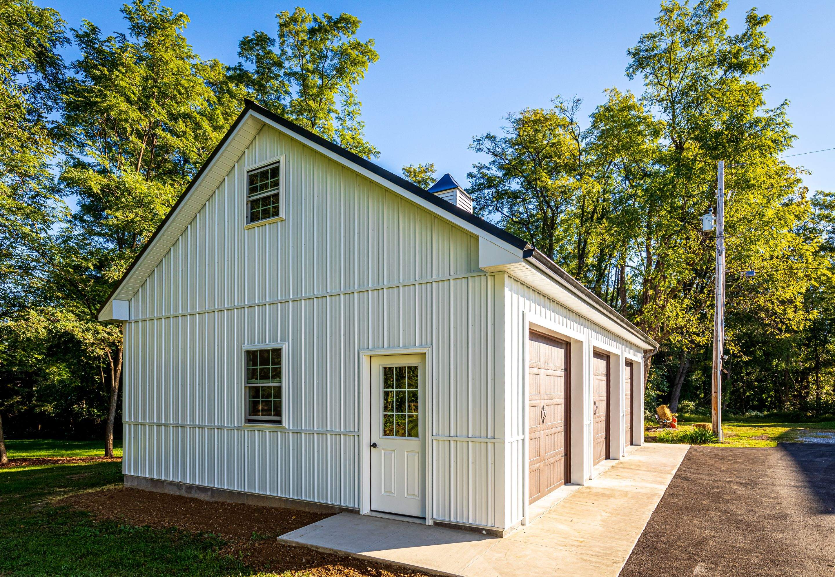 Metal Roof-black New Garage by Esh Builders
