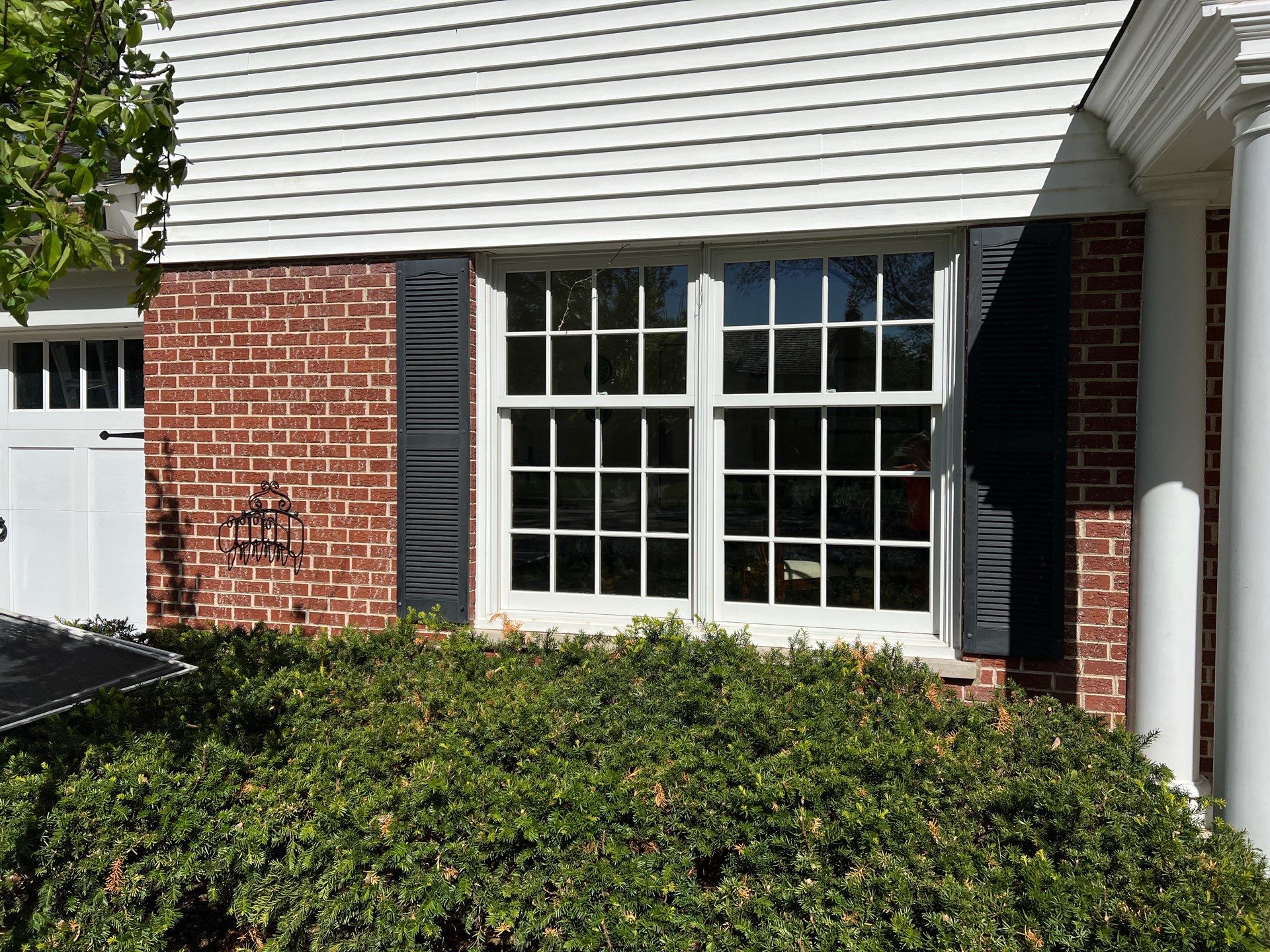 Housewashing  using Algaecide, soft wash soap by Northern Power Washing LLC.