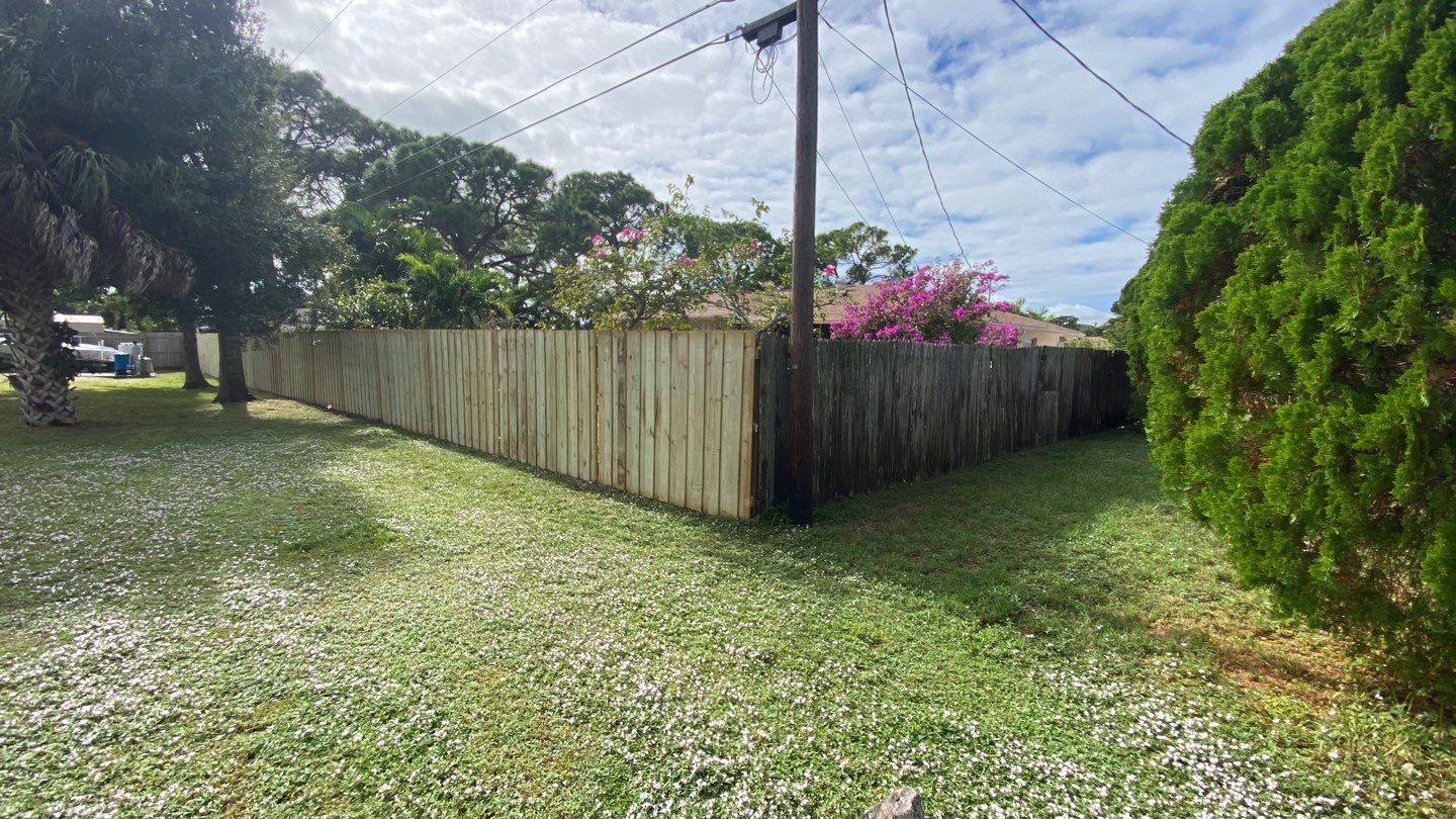 Wood Fence Installation using Board on Board Wood Fence by Asap fence and gates, LLC