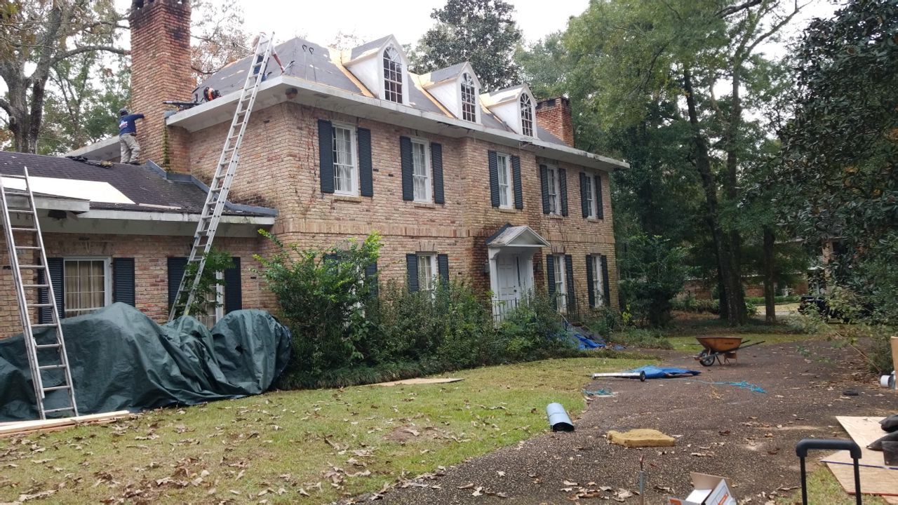 Residential Roofing Installation using Roof Replacement by American Roofing & Construction LLC