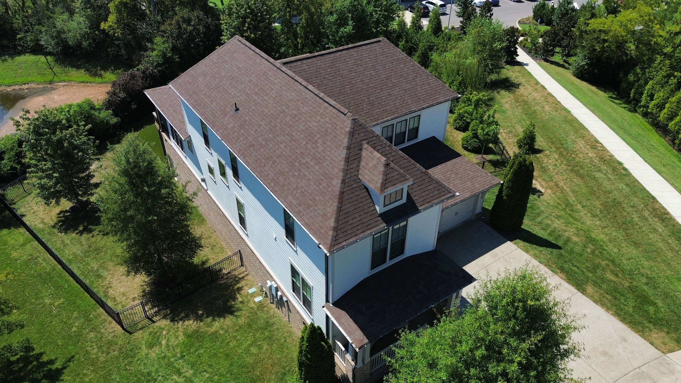 Architectural Asphalt Shingle Roof Replacement and Downspout Installation in Franklin by Shinglesmiths Roofing