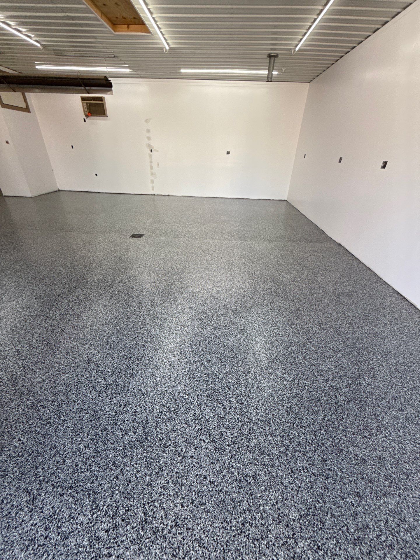 Domino Garage Floor Coating by Level 10 Coatings