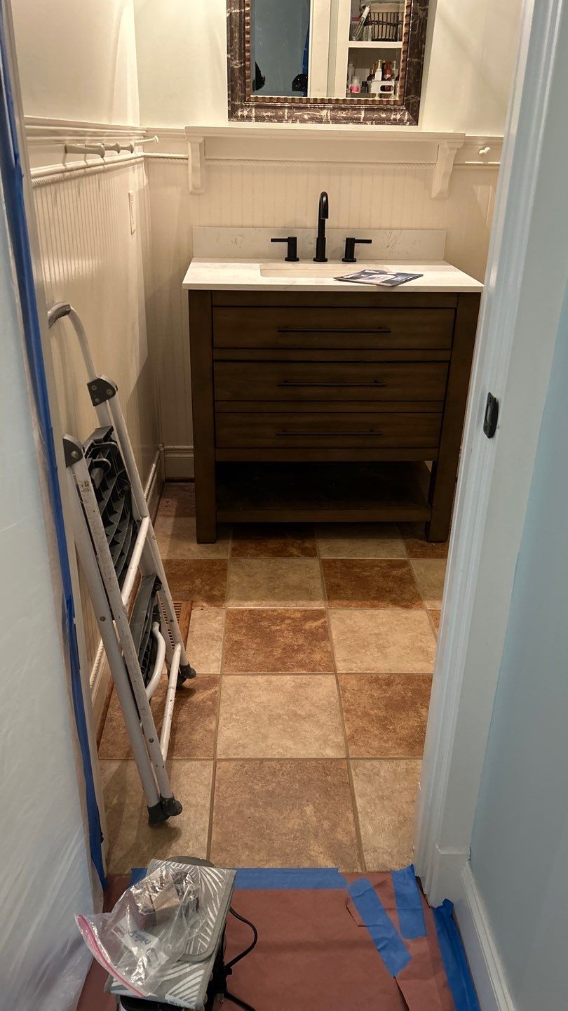 Tile shower and floor by Footprints Floors of Nashville