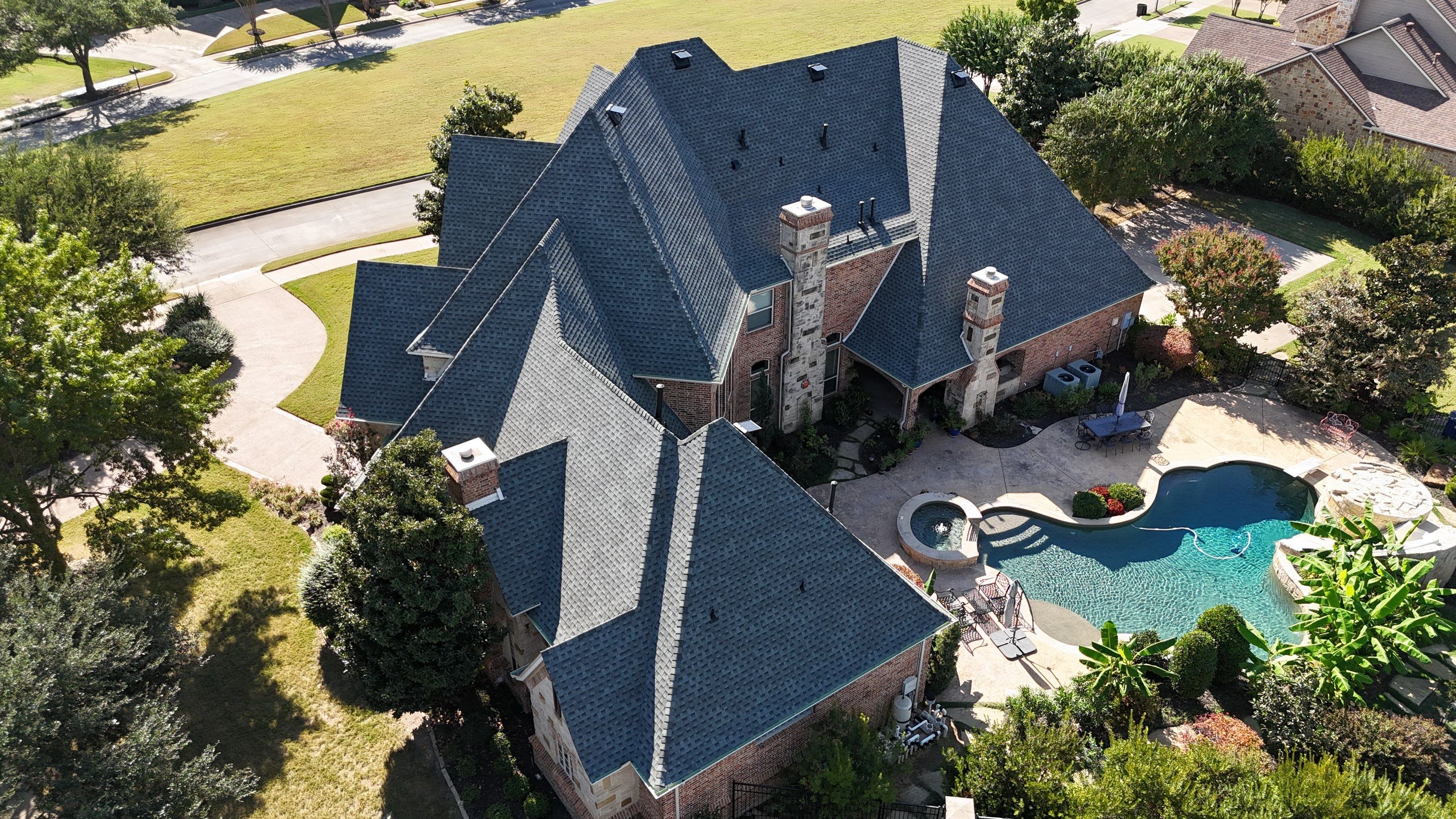 Southlake Texas Estate - Roof, Copper Awning and Gutter Project by First United Roofing & Construction
