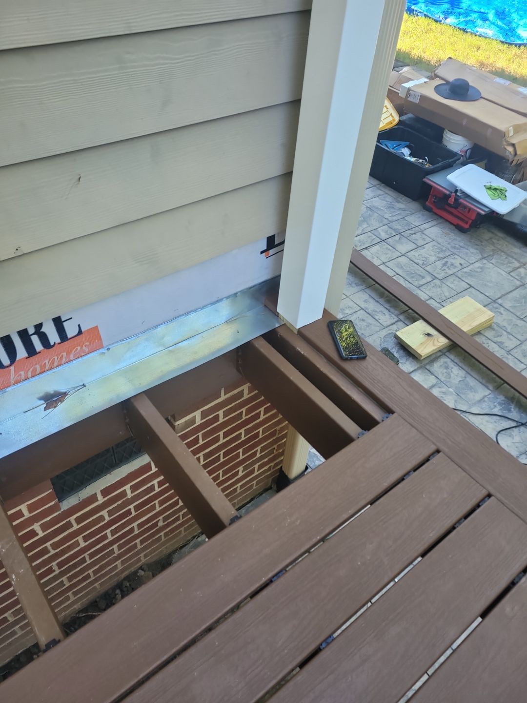 Fuquay-Varina Outdoor Upgrade – Composite Deck & Paved Landing by Elite Remodeling and Design LLC