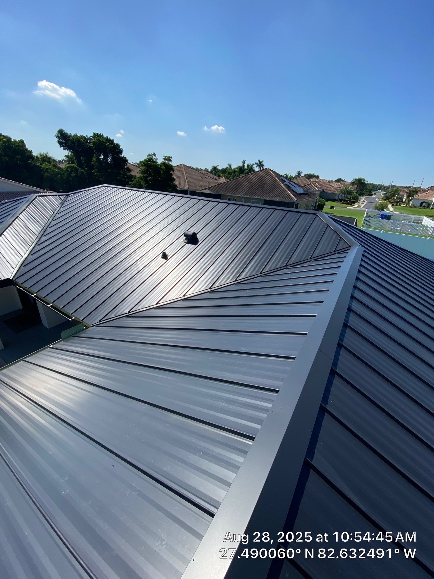 Metal Roofing System by Rooster Roofing, LLC