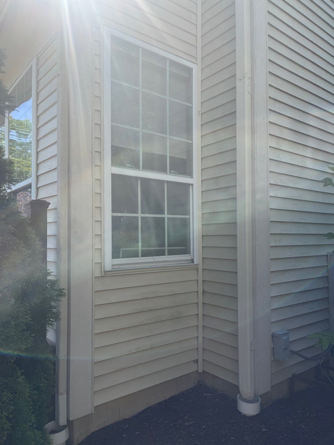 Housewashing  using Algaecide, soft wash soap by Northern Power Washing LLC.