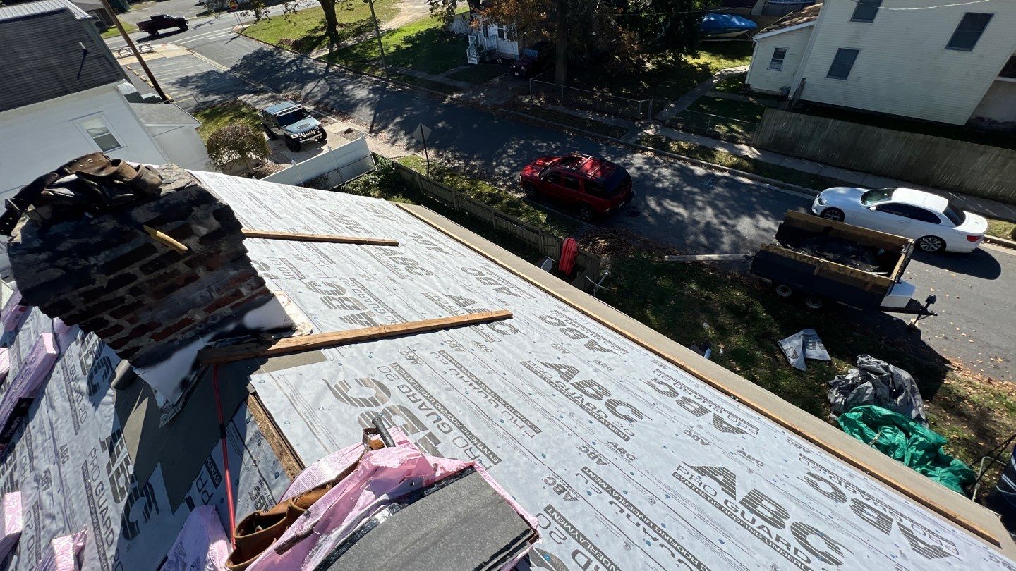 Onyx Black Shingles by Reimagine Roofing