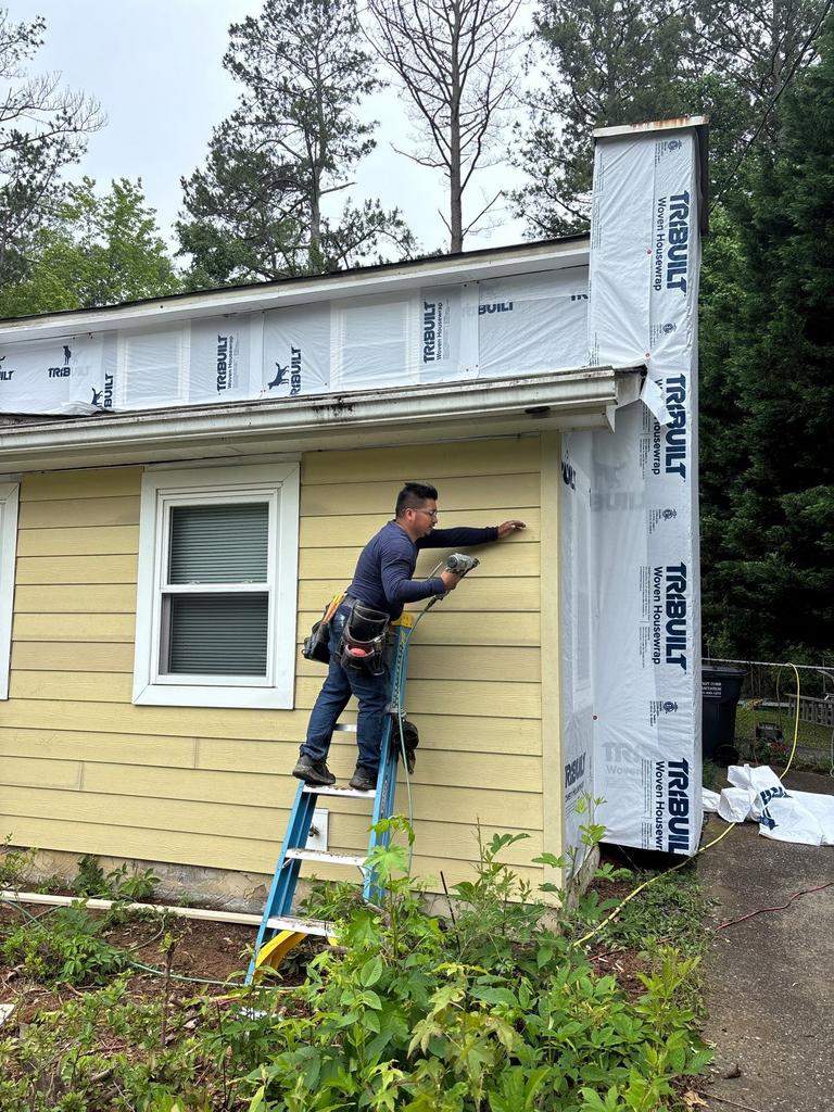 Marietta, GA Siding, Rotten Wood, Front Door, and Gutter Replacement with Exterior Painting by Nelson Exteriors