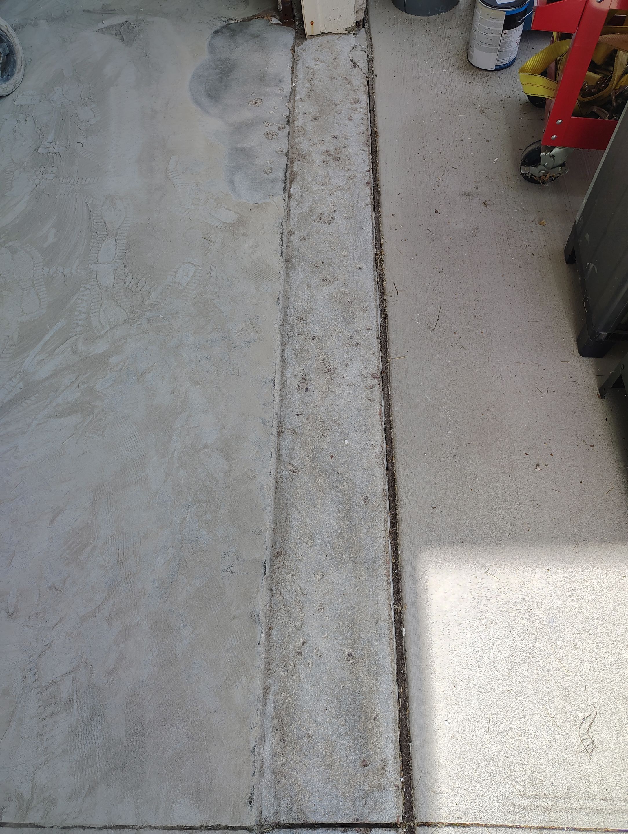 Custom Grey Speckled Epoxy Floor Coating for Sioux Falls Garage by Select Painting, Coatings & Garage Cabinets