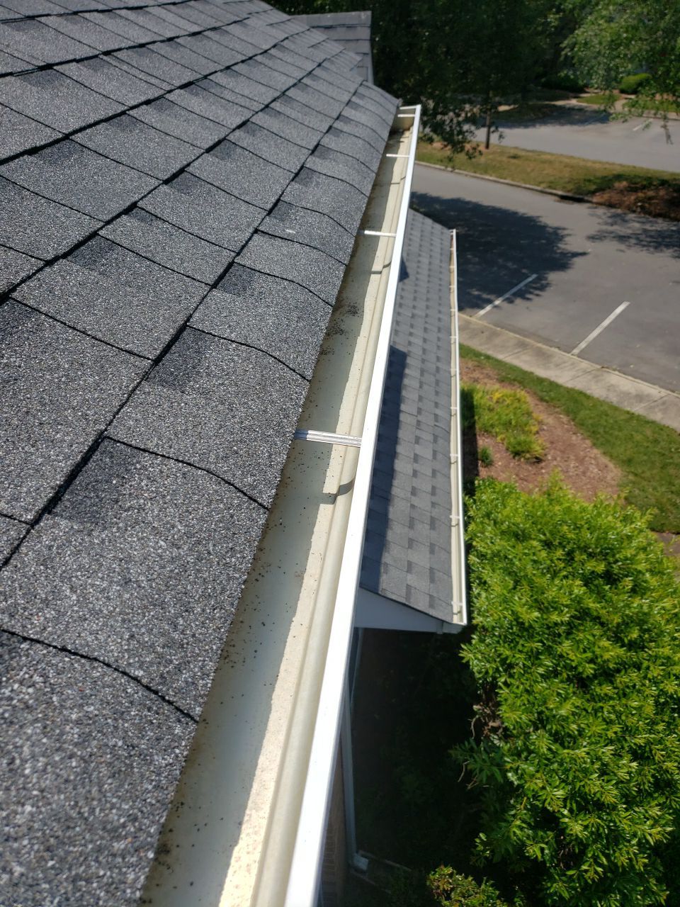 Gutter Cleaning using water by Power Wash Masters LLC