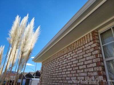 Seamless White Gutter and Downspout Installation in Albuquerque