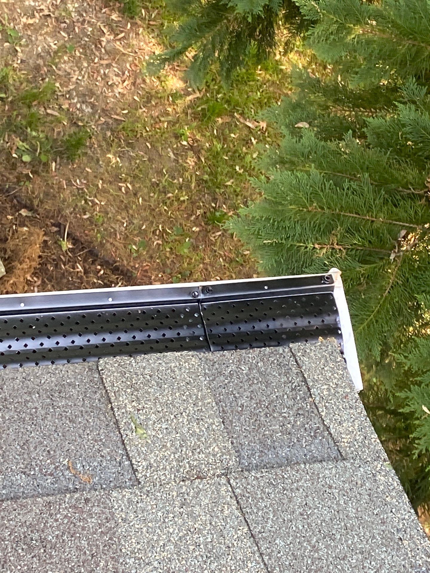 Gutter Installation using Black Gutter Guards  by Storm Ready Exteriors