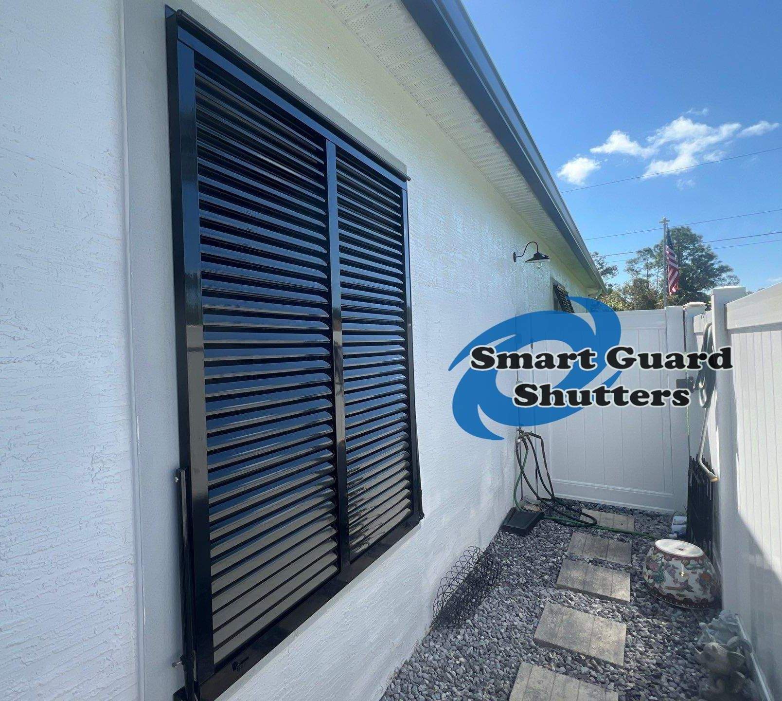 Impact Bahama Shutters in Jet Black by Smart Guard Shutters