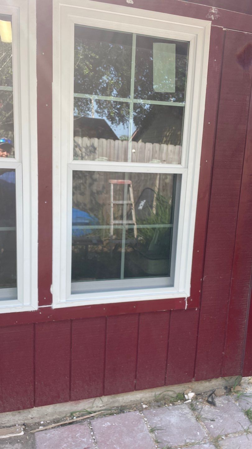 Black and white and red all over by Bayfront Roofing and Construction
