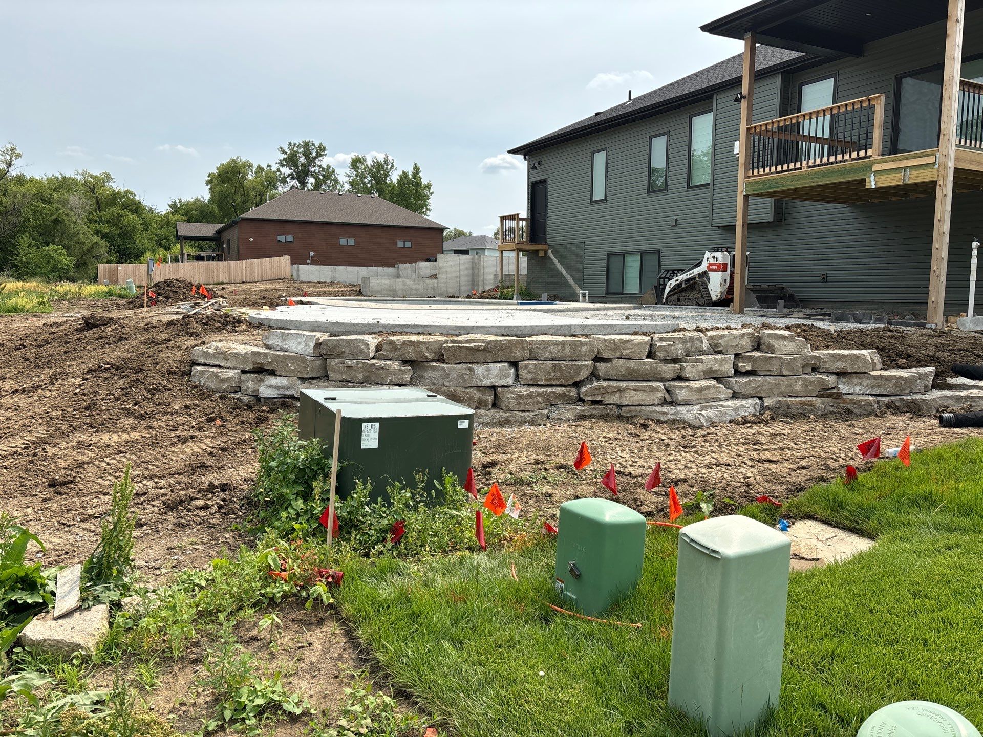 New Residential Construction - Paver, Putting Green, Pool by New Horizon Landscapes