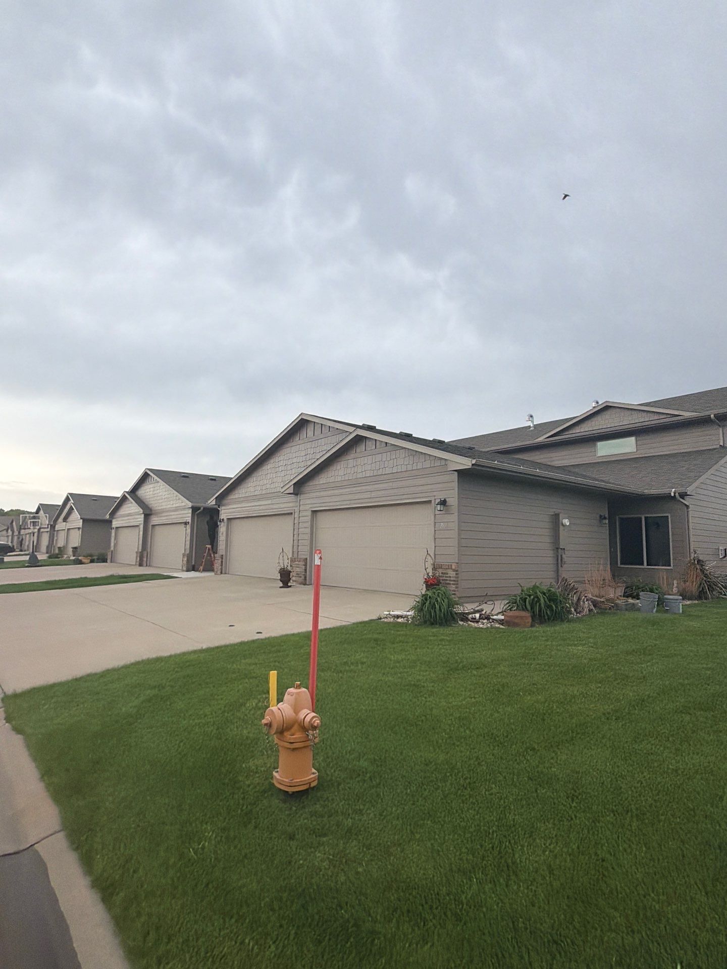 Multi-Family Exterior Painting and Trim Refresh in Sioux Falls by Select Painting, Coatings & Garage Cabinets