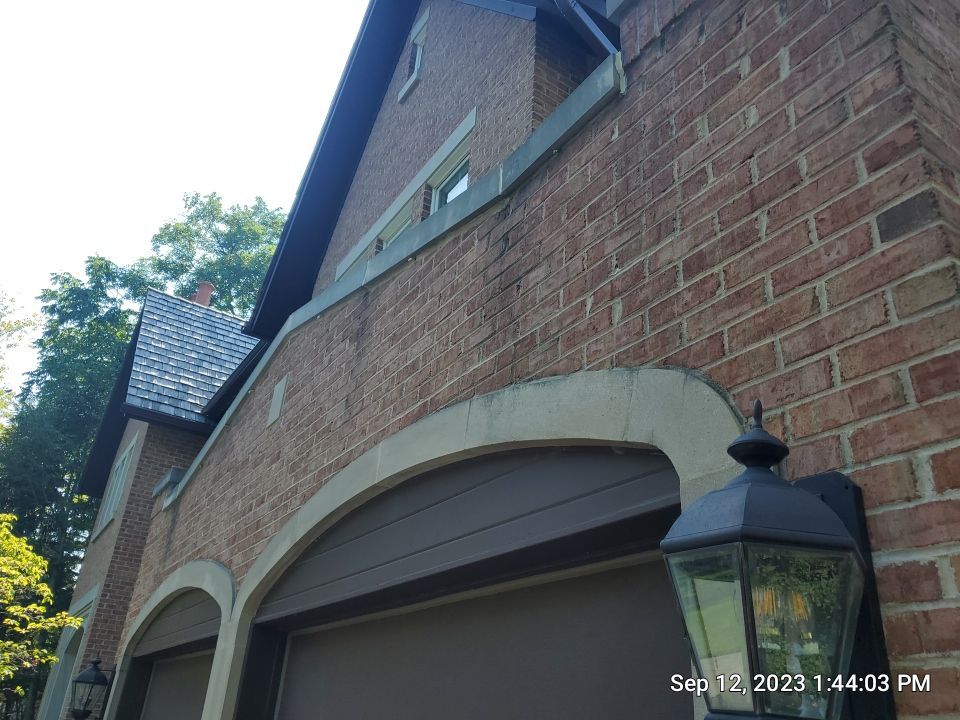 natural stone using Algaecide, soft wash soap by Northern Power Washing LLC.