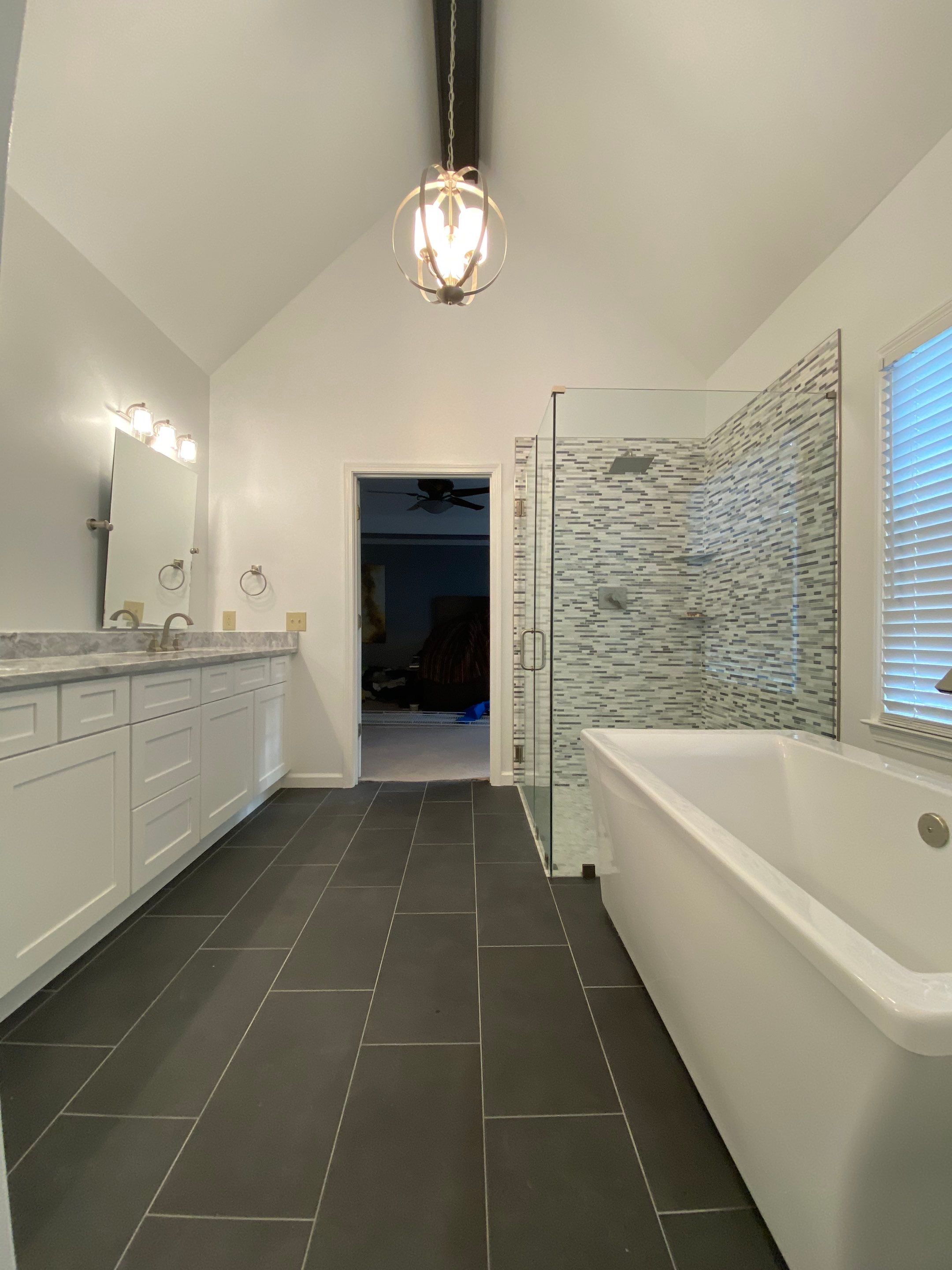 Modern Master Bathroom Remodel with Stacked Stone in Kennesaw by Swift Home Renovations