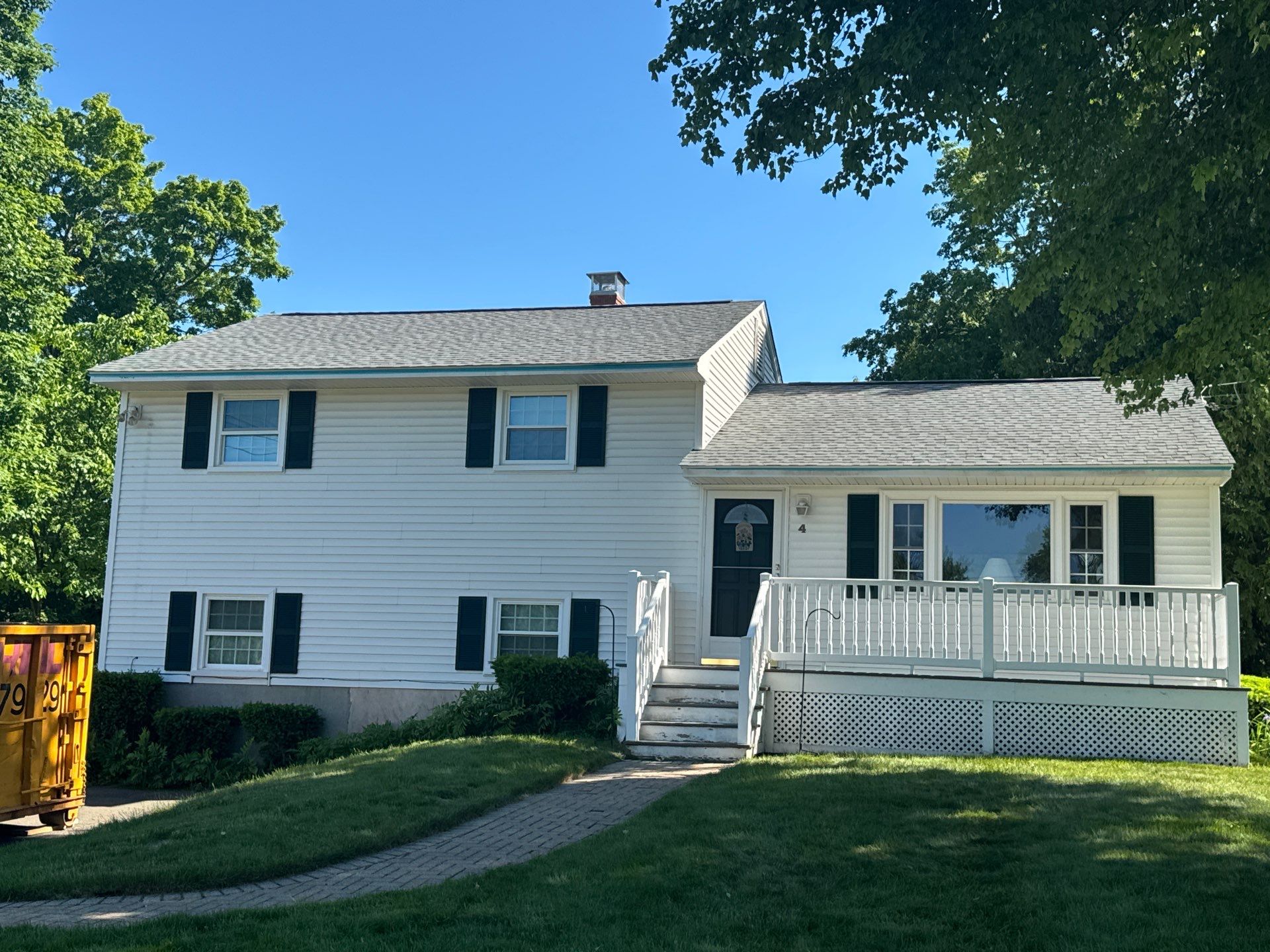 Beautiful new asphalt shingles on a roof in Vernon! by DiGiorgi Roofing and Siding Inc