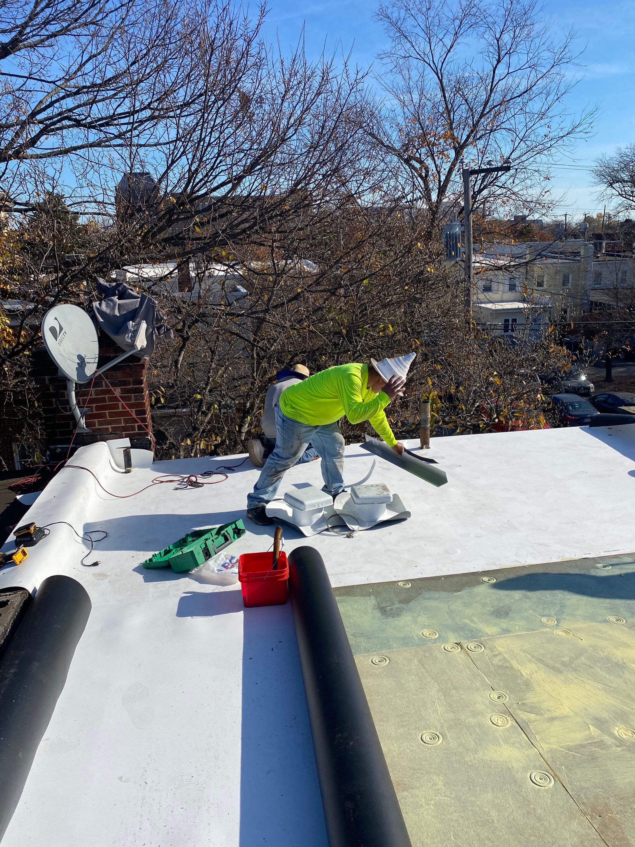Alexandria: Residential Flat Roof Replacement with Mule Hide TPO Membrane by RM Banning, Inc.