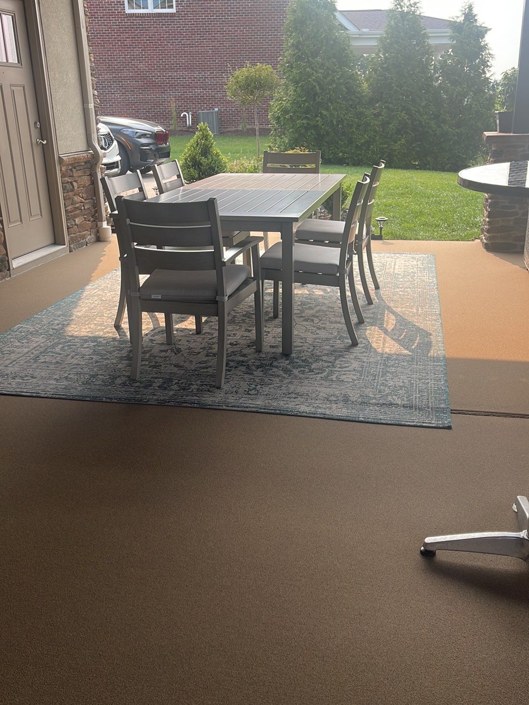 Large Patio + Garage Project in Moon Township by Floors in a Day, Inc