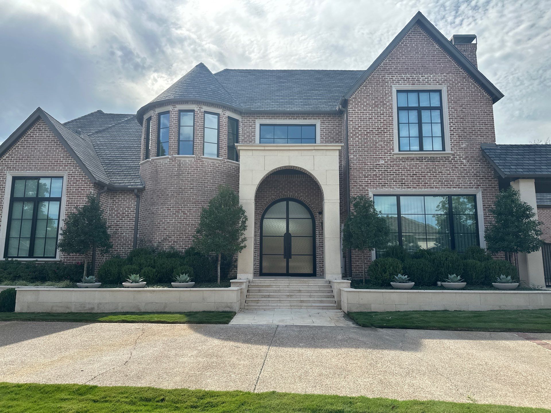 Custom Arched Metal Entry Door Installation in Plano by Solara Custom Living