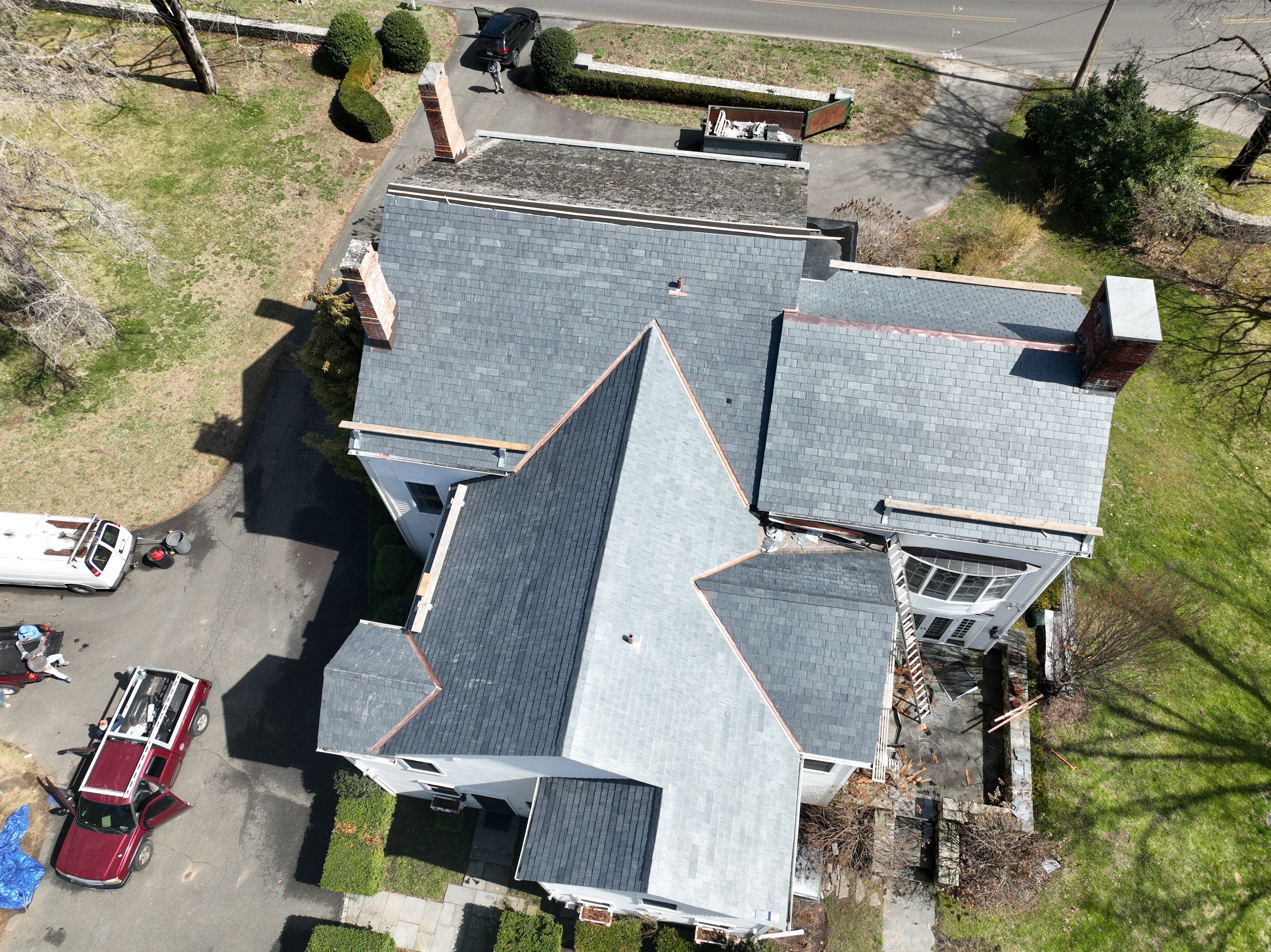 Residential Roofing Installation using Vermont Slate by A Plus Exterior