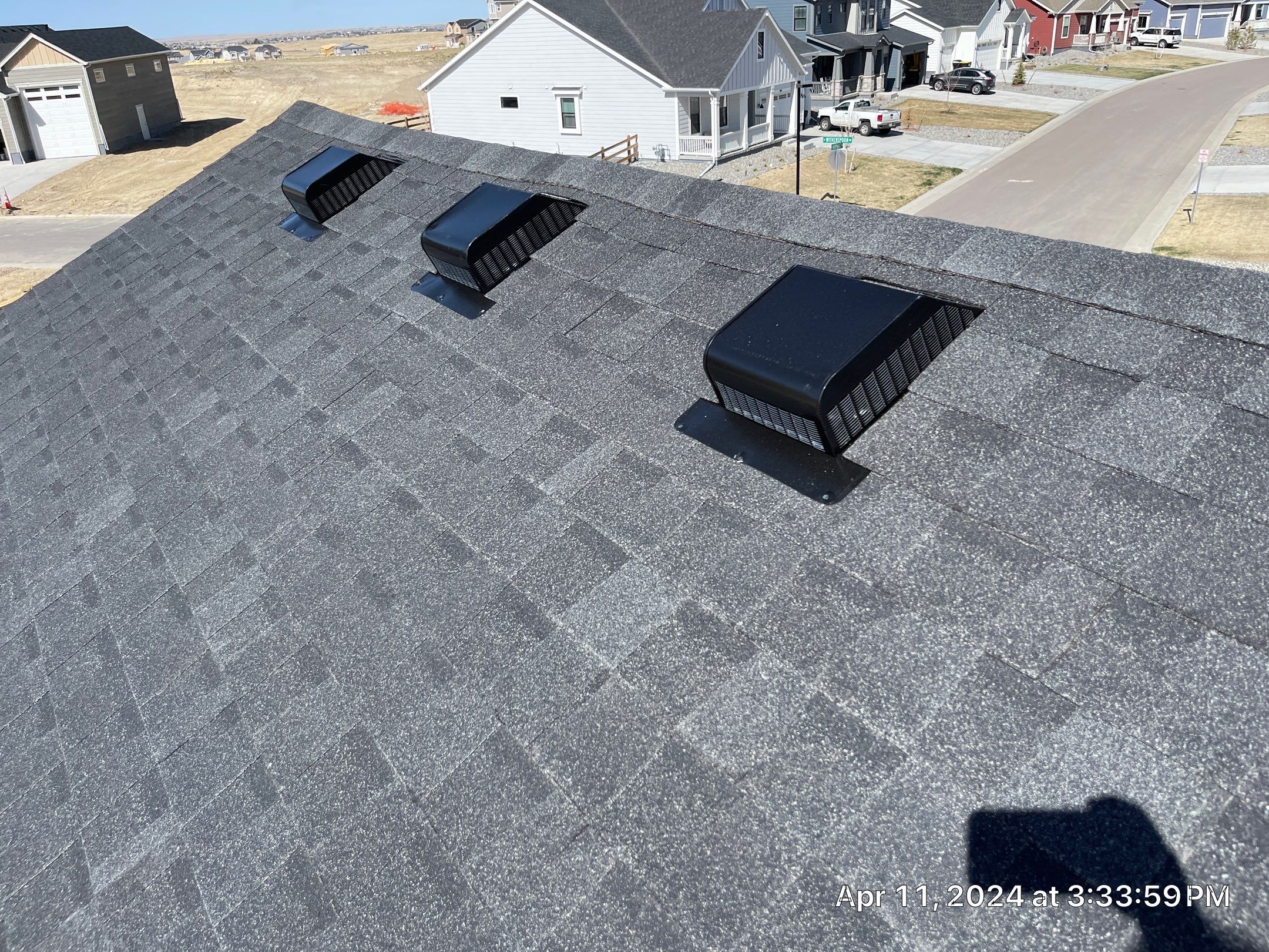 Residential Roofing Installation using Atlas Pinnacle Impact Black Shadow by Blue Peaks Roofing LLC 
