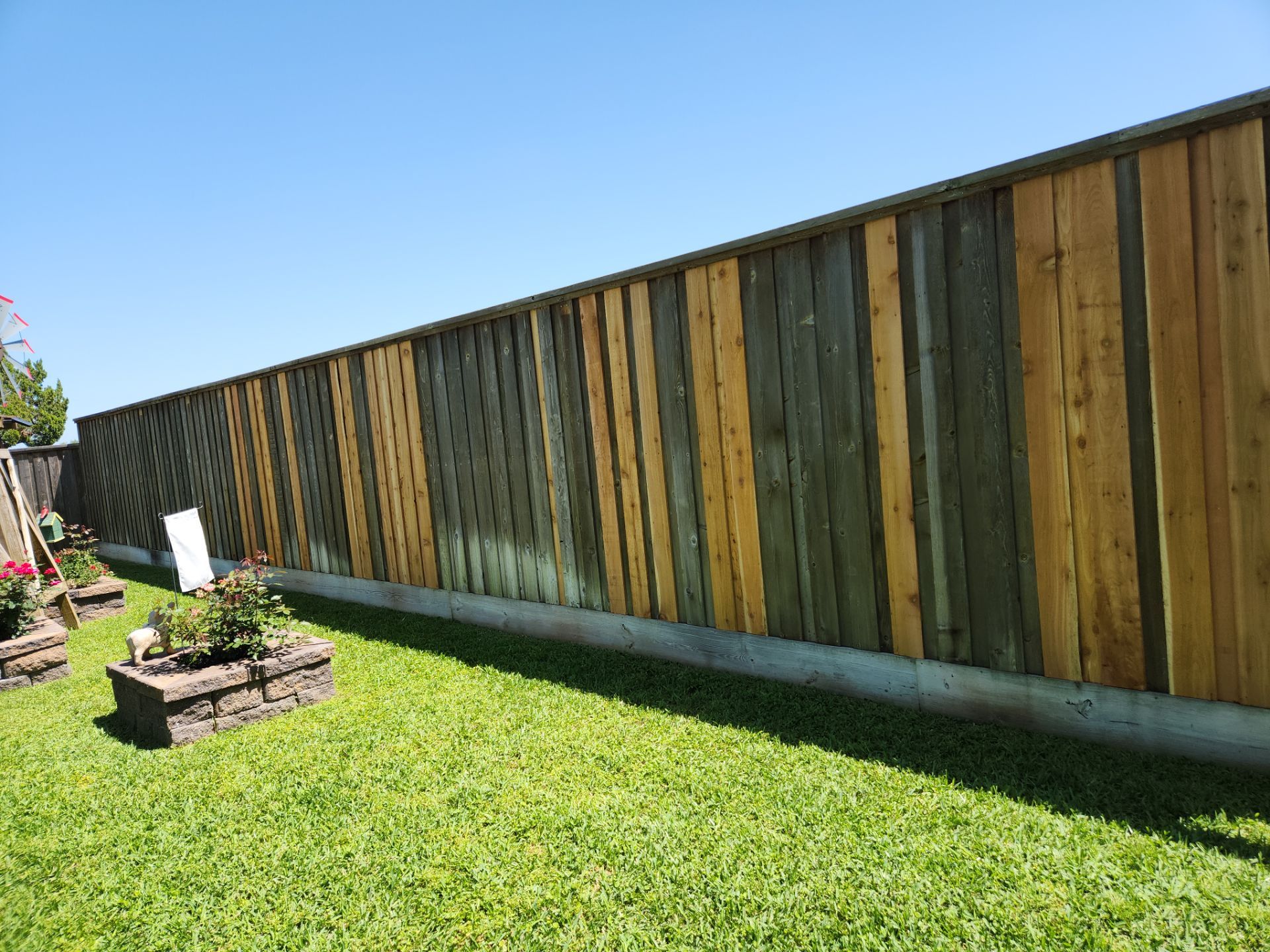 Modern Black Fence Finish by Tim's Fences
