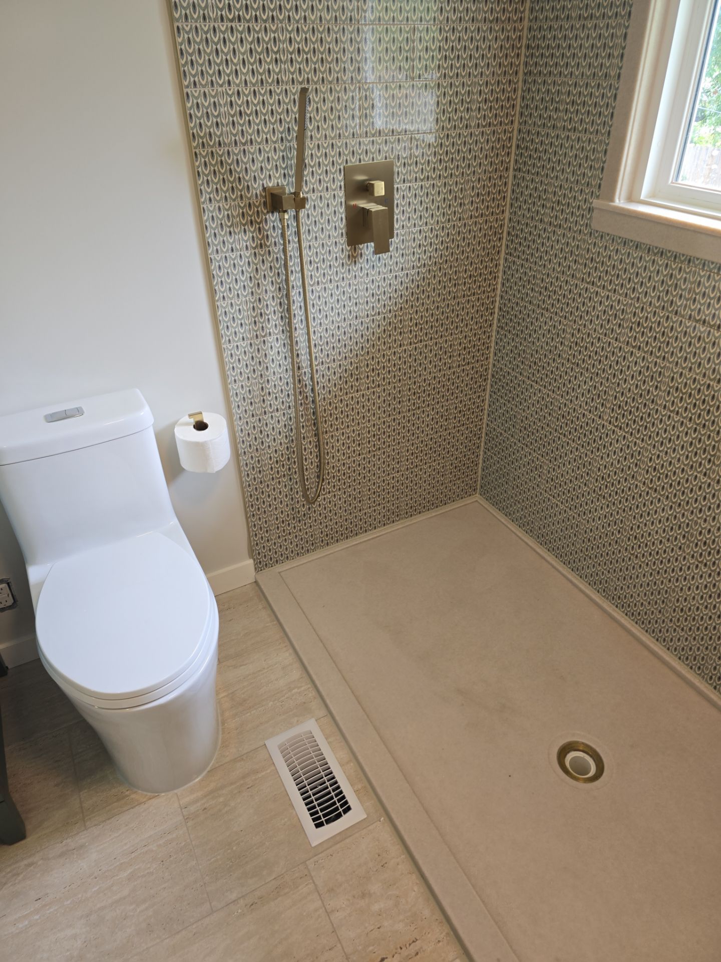 Full bathroom with custom tile by The Shower Company