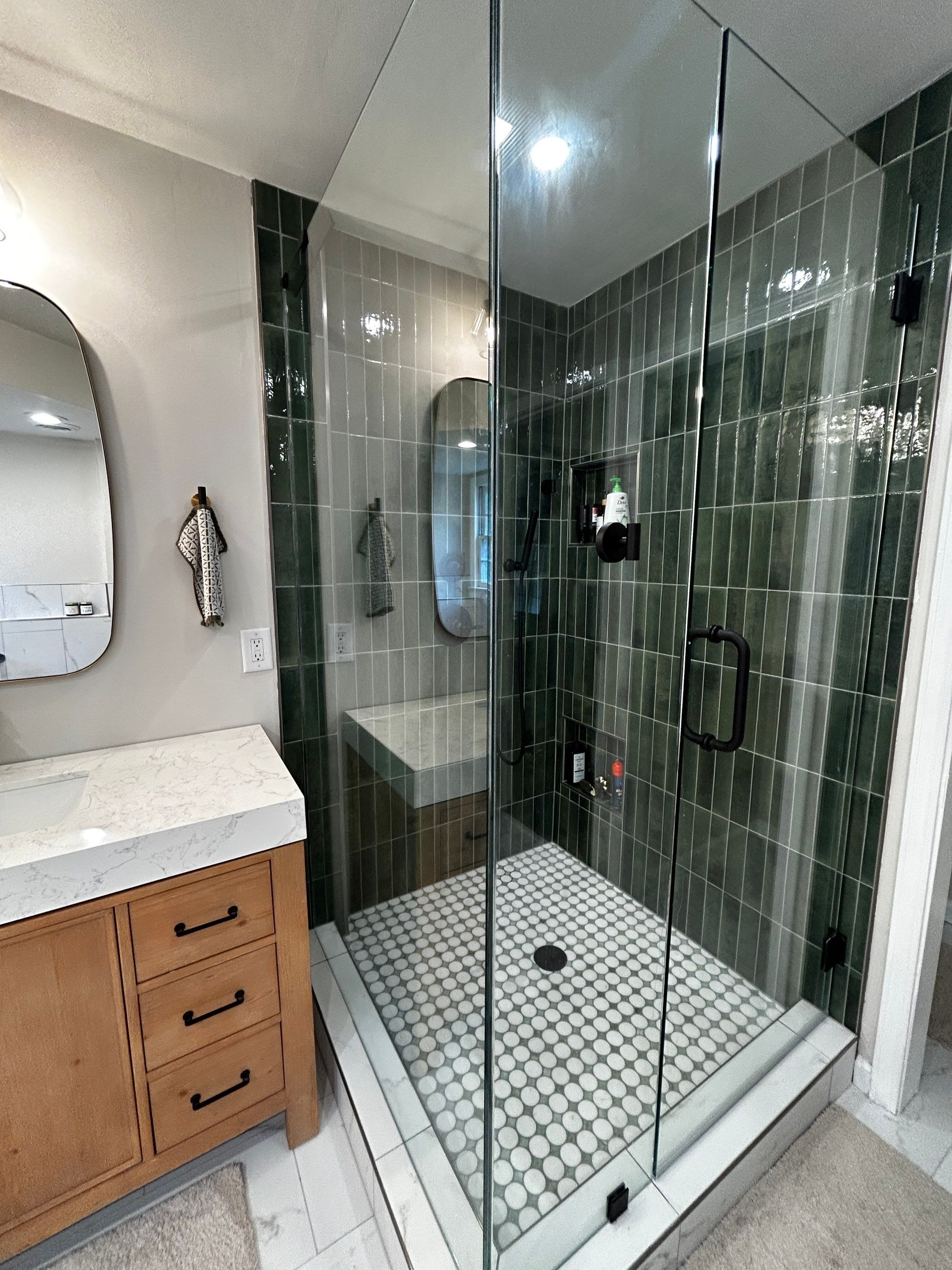 Spa like bathroom by Footprints Bath and Tile of East Atlanta