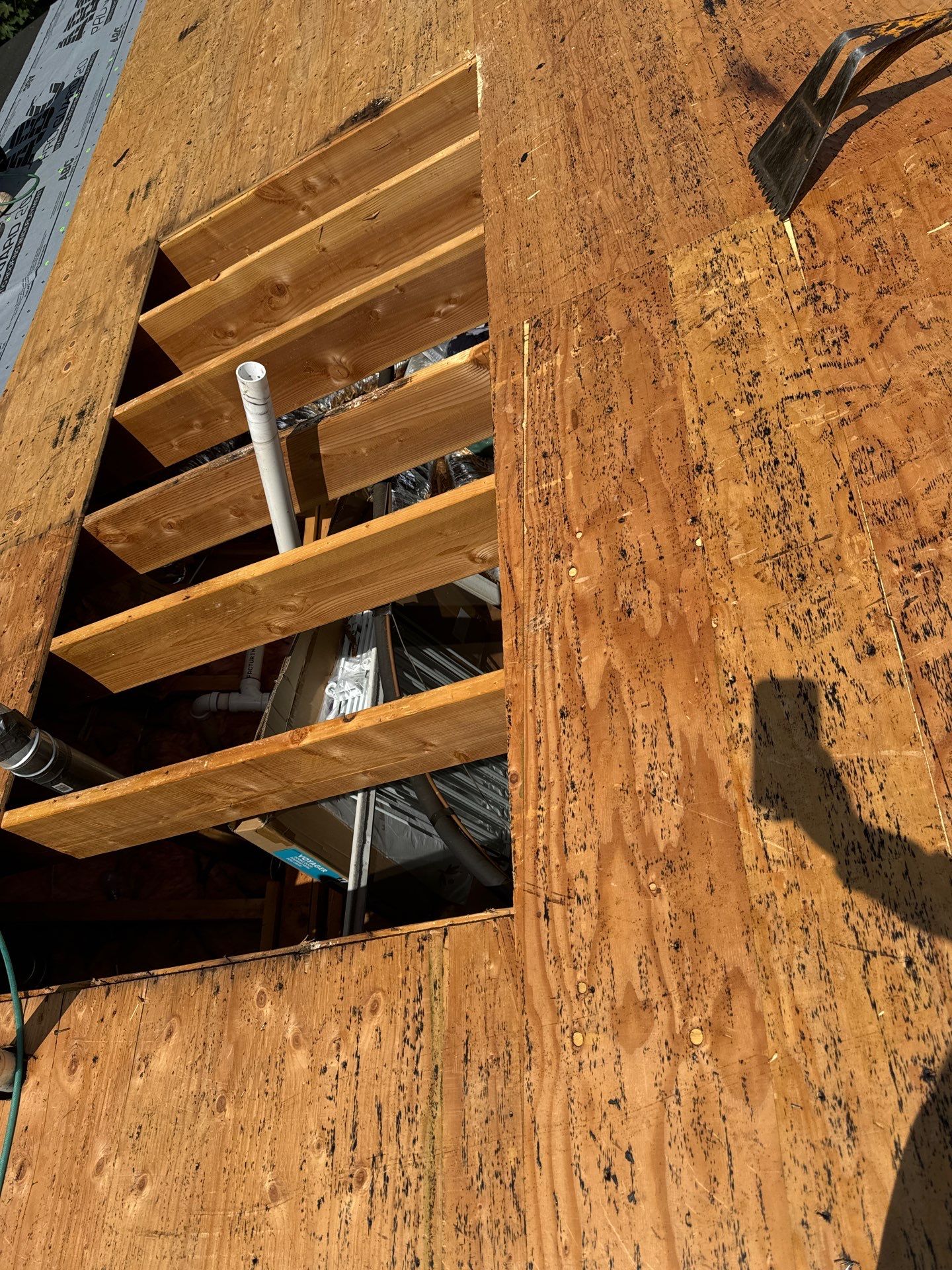 Charcoal Shingles by Reimagine Roofing