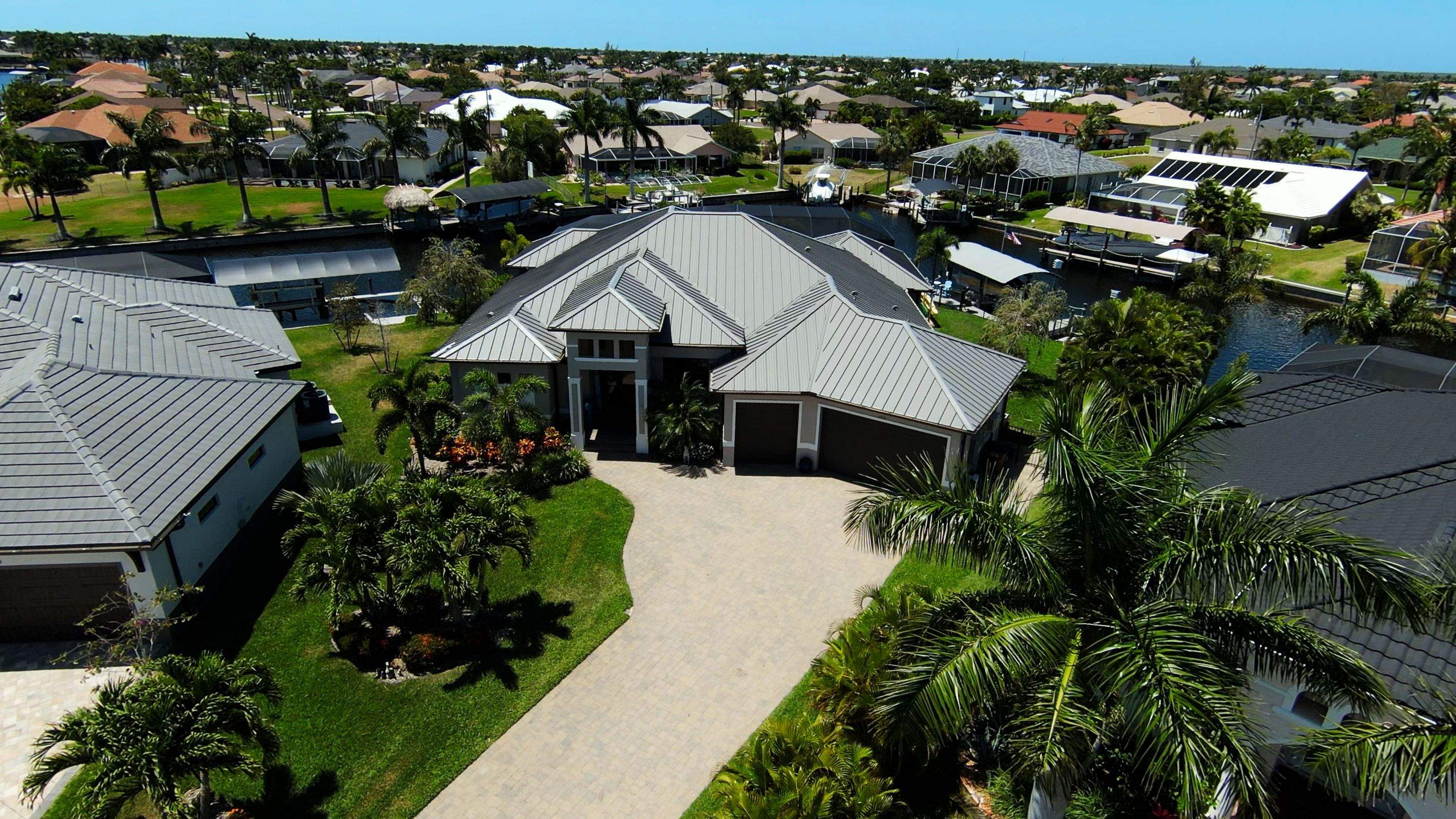 Residential Roofing Installation using Gulf Coast Metals Gulf Seam Panels by Four Peaks Roofing