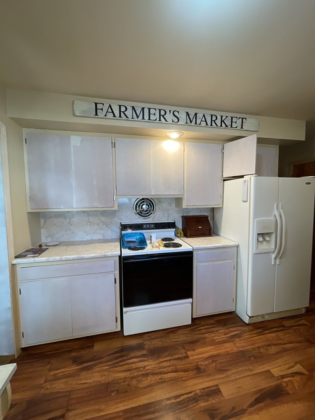 Painting Kitchen Cabinets and Walls using Sherwin Williams paint by Lightning Exteriors