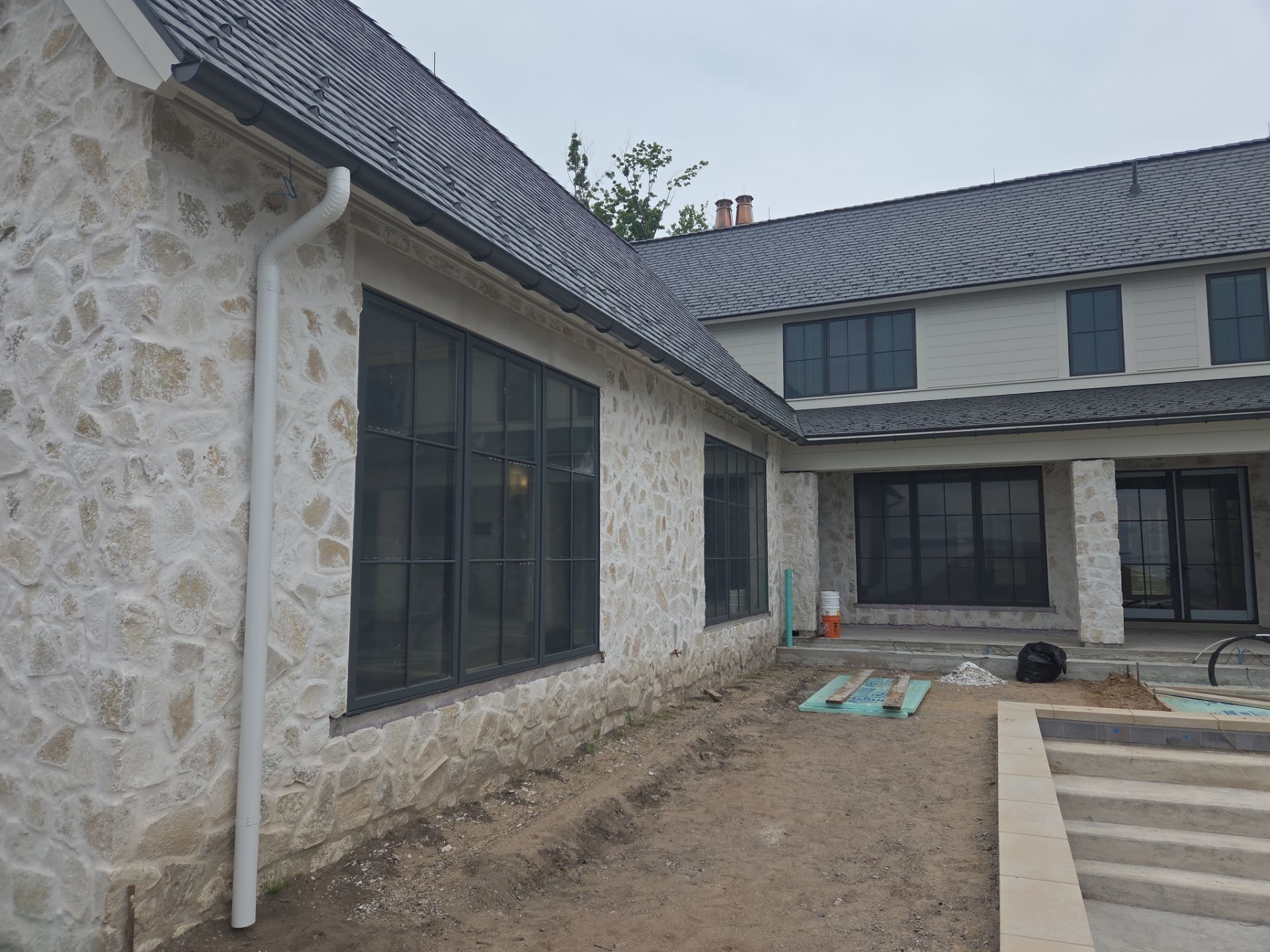 Half Round Gutter Installation for Petoskey Residence by Rainbow Seamless Systems