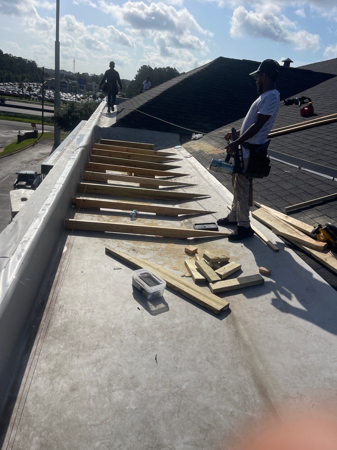 Commercial Roofing Installation using Roof Replacement by American Roofing & Construction LLC