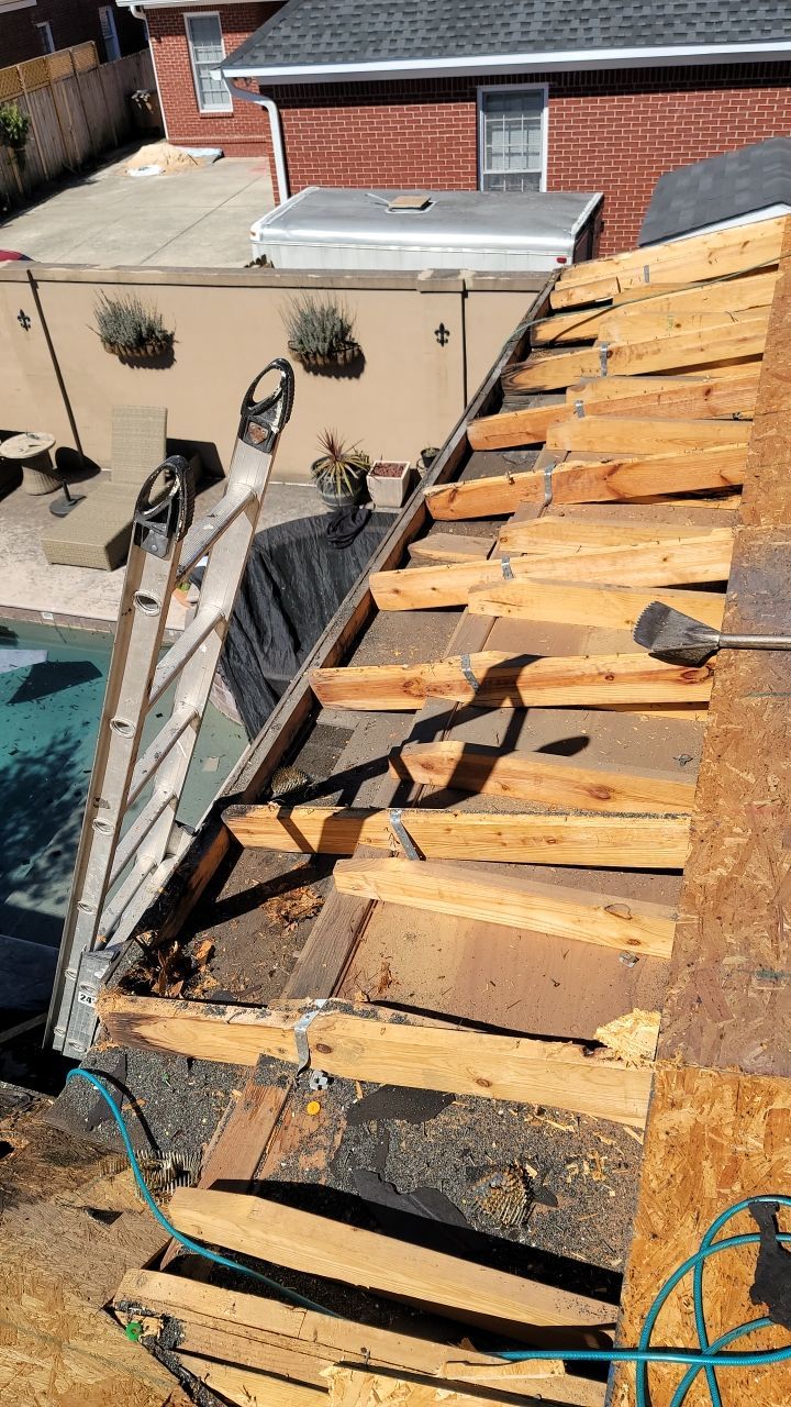 Residential Roofing Installation using Roof Replacement by American Roofing & Construction LLC