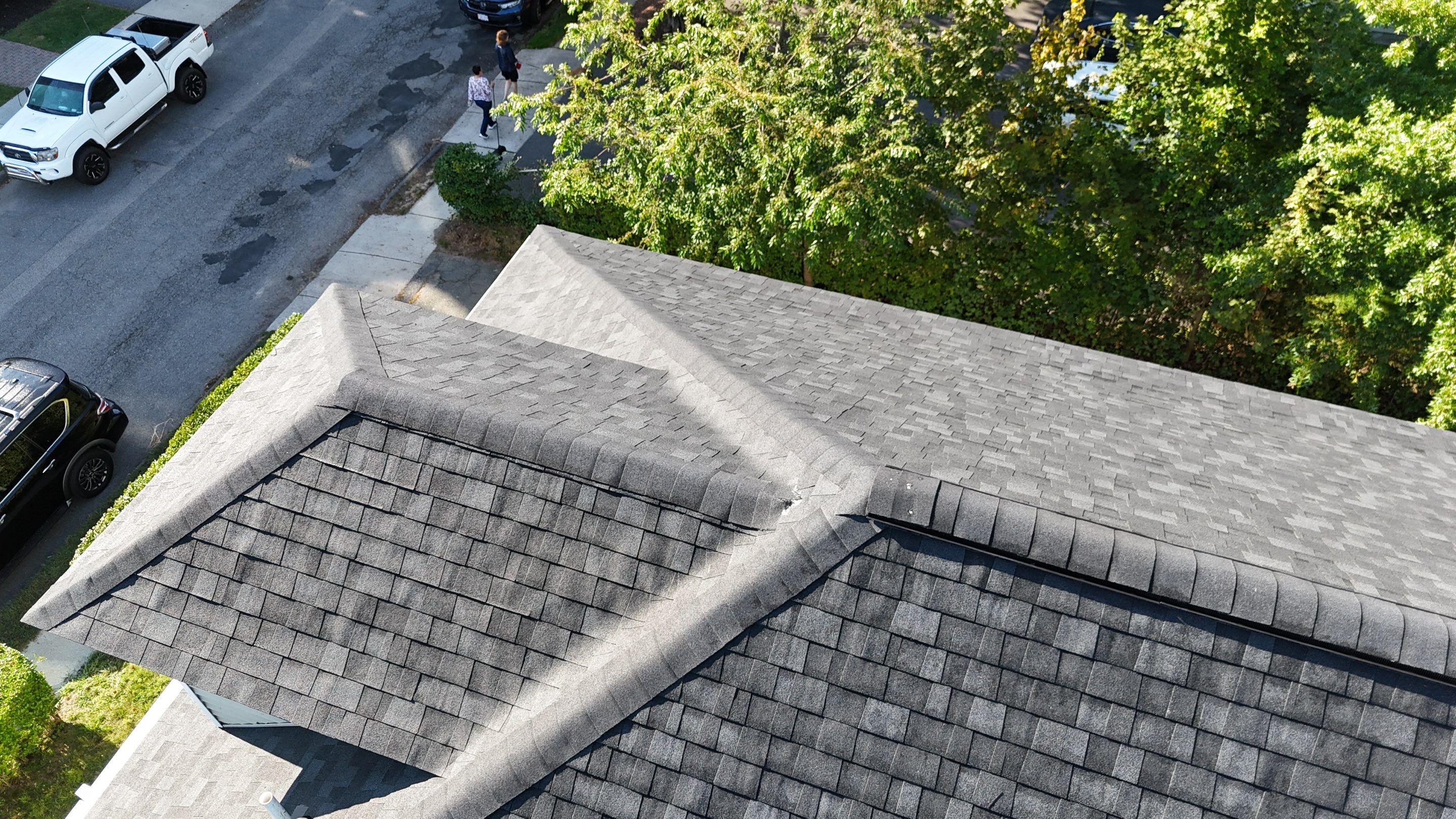 Roof Replacement with Skylight Flashing in Waltham, MA by Mighty Dog Roofing of Greater Middlesex County
