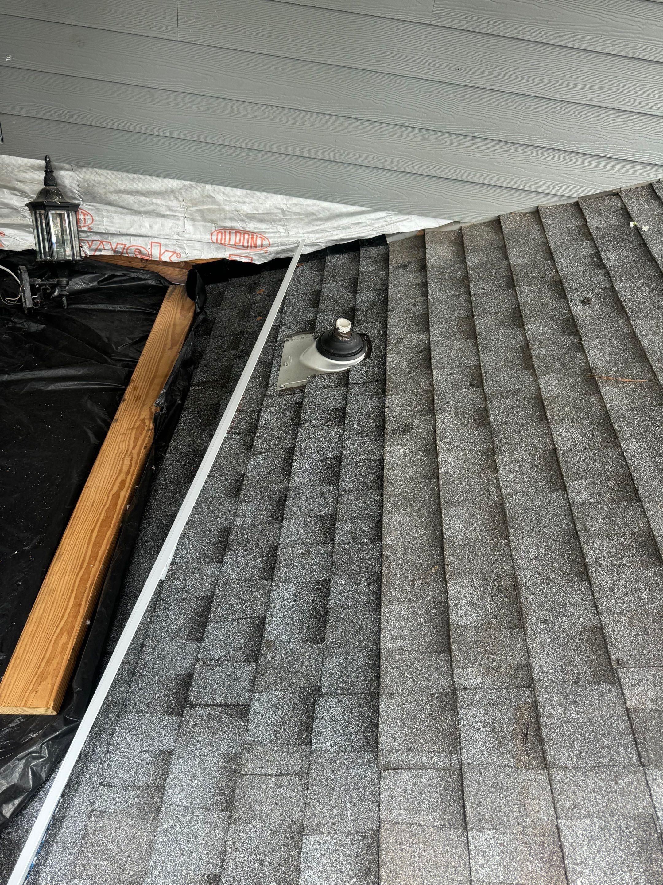 Roof Leak occurring at Sloped Roof-Flat Roof pitch break by Associates Roofing Unlimited 