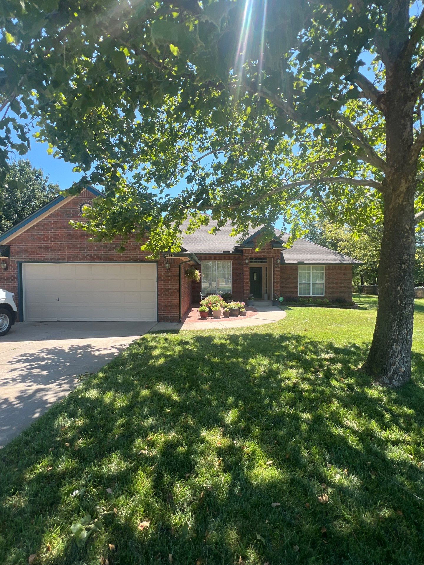 Roof Replacement and Gutter Installation in Edmond, OK by McCann's Roofing and Construction
