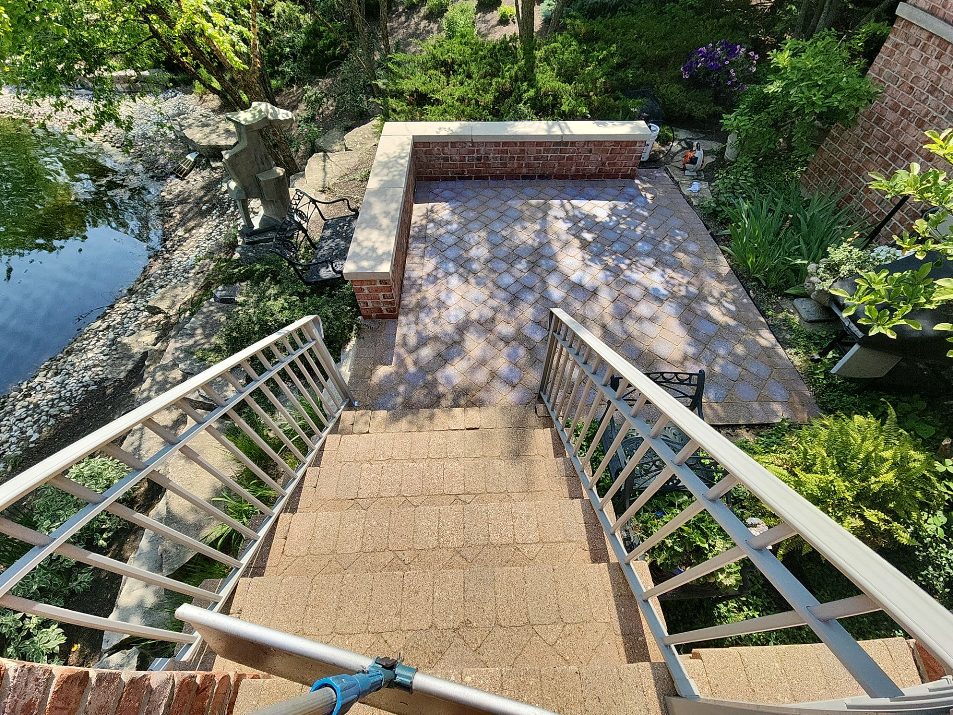 Brick paver cleaning sanding and sealing by Northern Power Washing LLC.