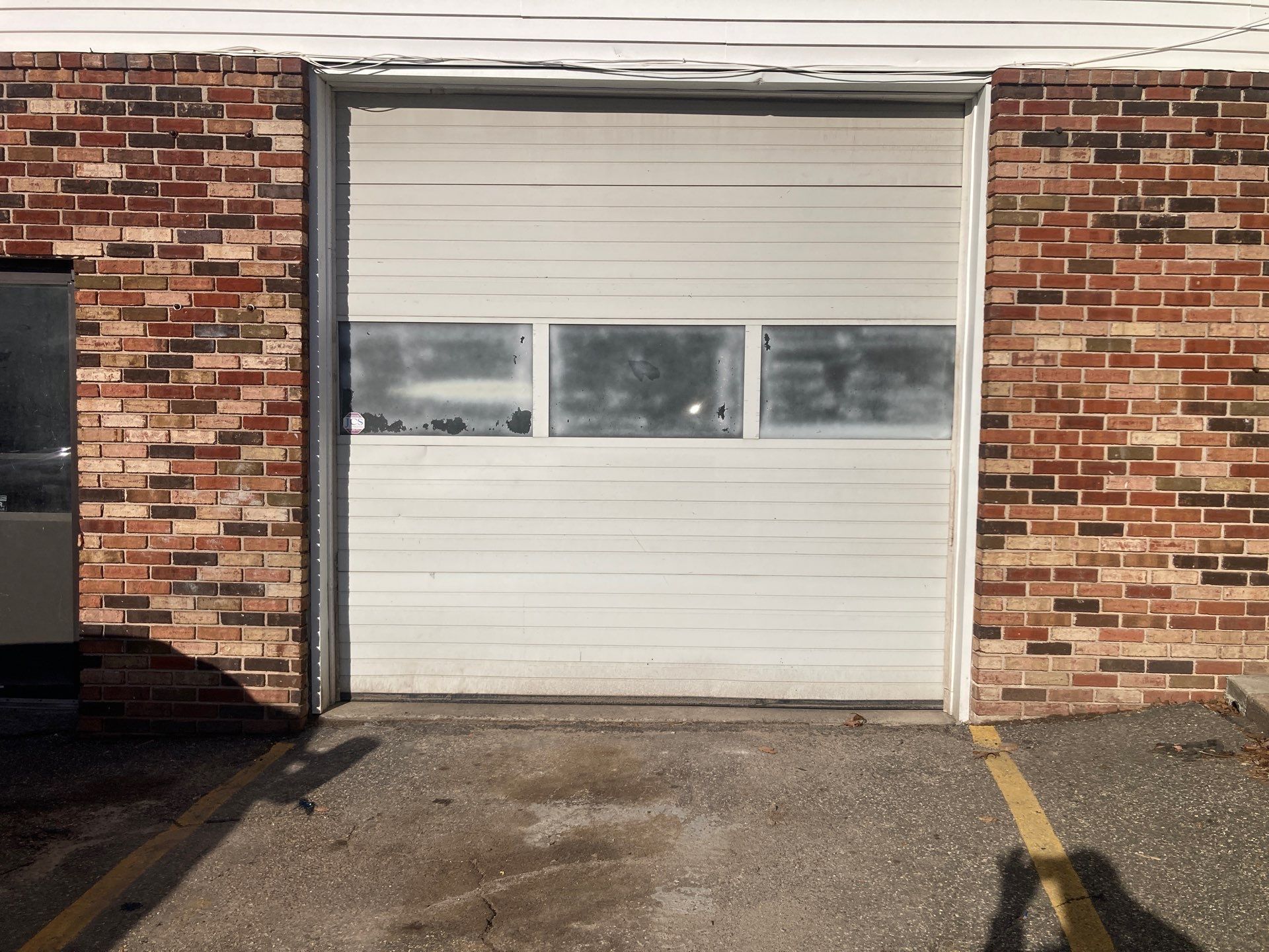 Commercial Overhead Door Installation by DiGiorgi Roofing and Siding Inc